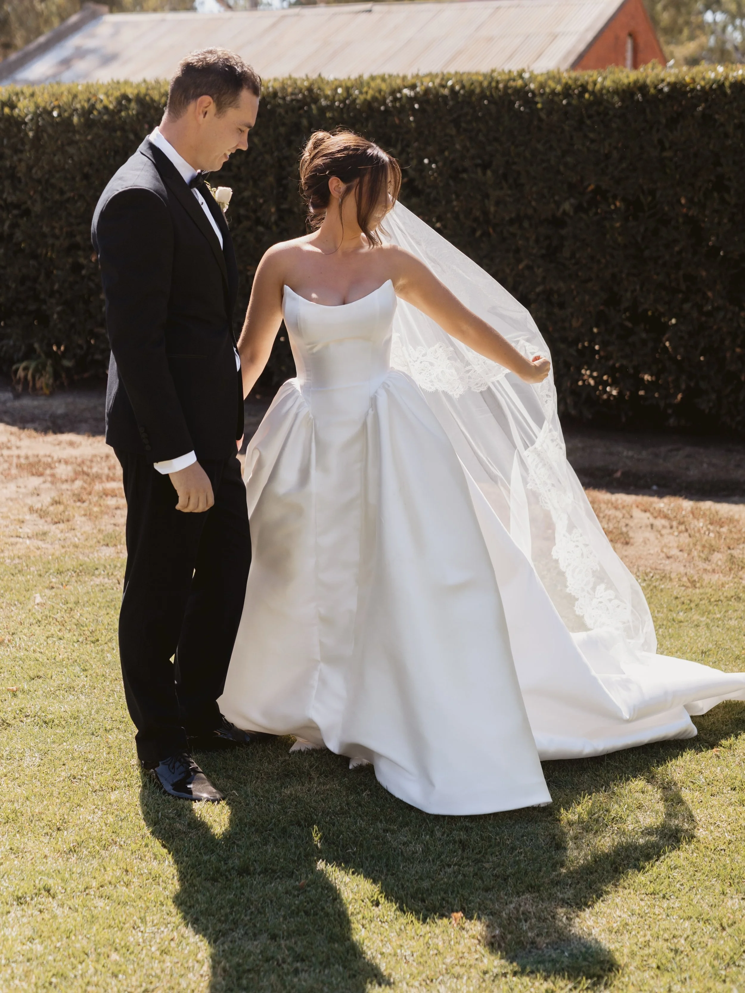 Alarna in the Madeline gown, structured, refined, and forever classic. 

This mikado ballgown is available to try in-person at our Melbourne and Sydney boutiques.