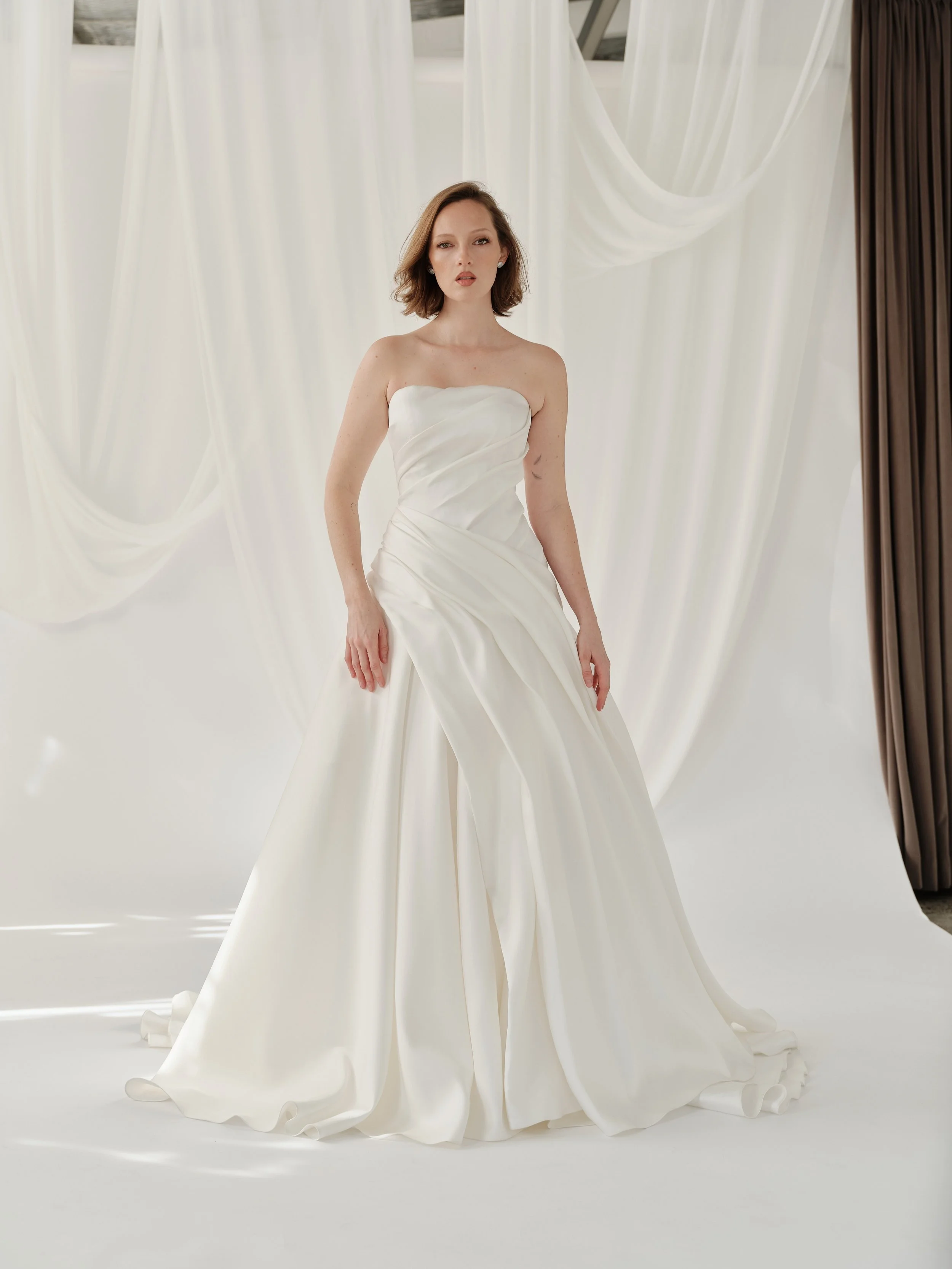 Sculpted in softness.
Defined by fluid draping, an asymmetric waist and effortless in movement. Modern, feminine and beautifully understated. Introducing Barbra