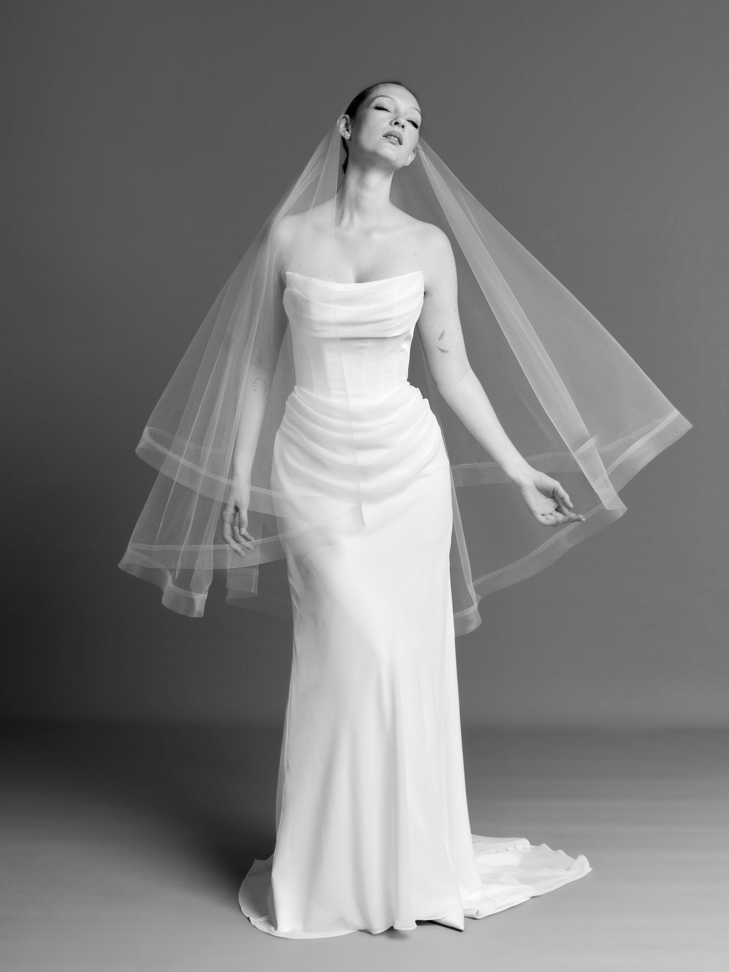 Sculpted. Sheer. Effortless.
Modern bridal, distilled. the Eloise II