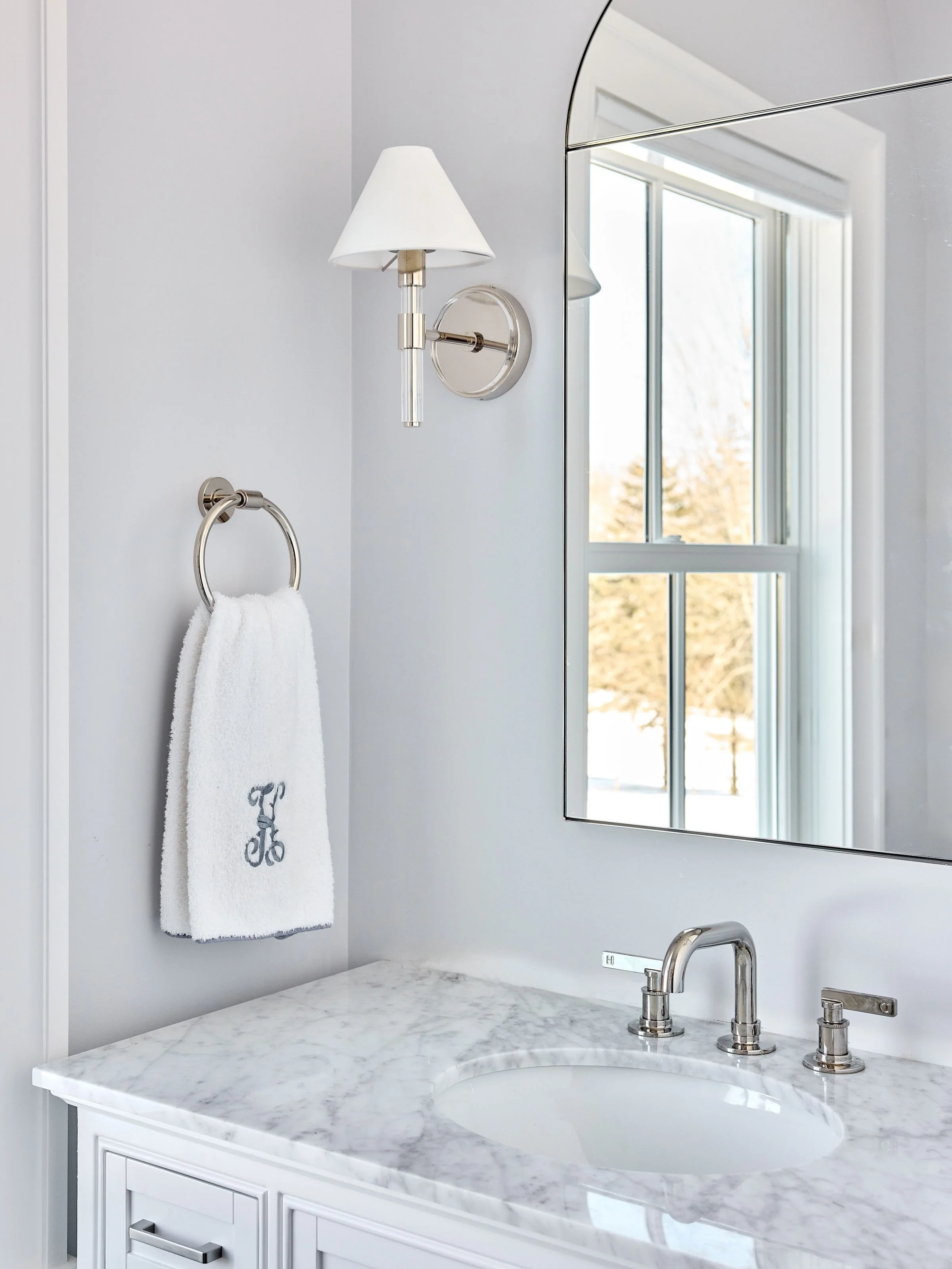 Crisp and bright, this beautiful bath is the perfect place to start and end your day. Polished nickel fixtures, and pretty marble surfaces create a timeless, spa-like feel. 

📸: @juliadags 

#haleydesigncompany 
#customhomes 
#marblebath