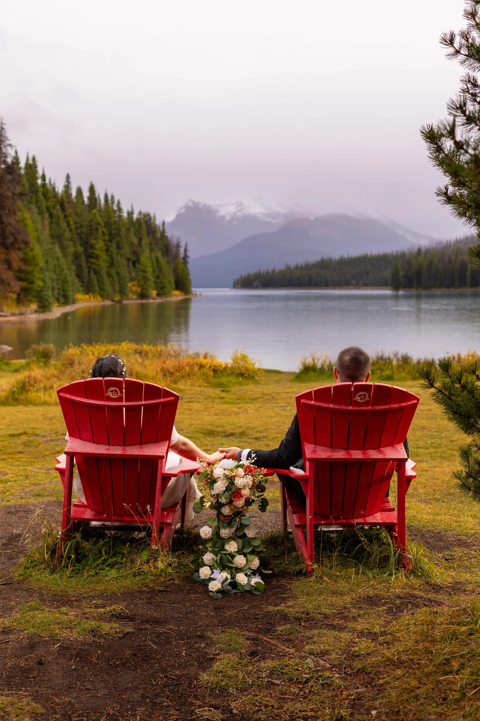 Maligne Lake Red chairs wedding photos