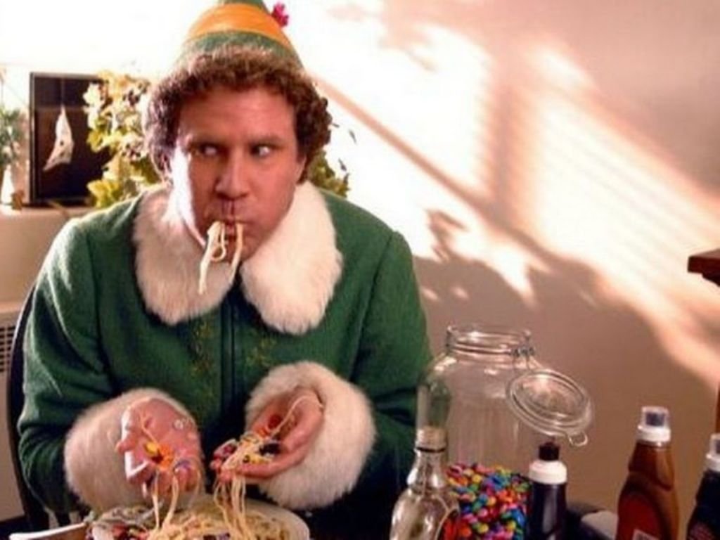 A giant elf gorging on sweets