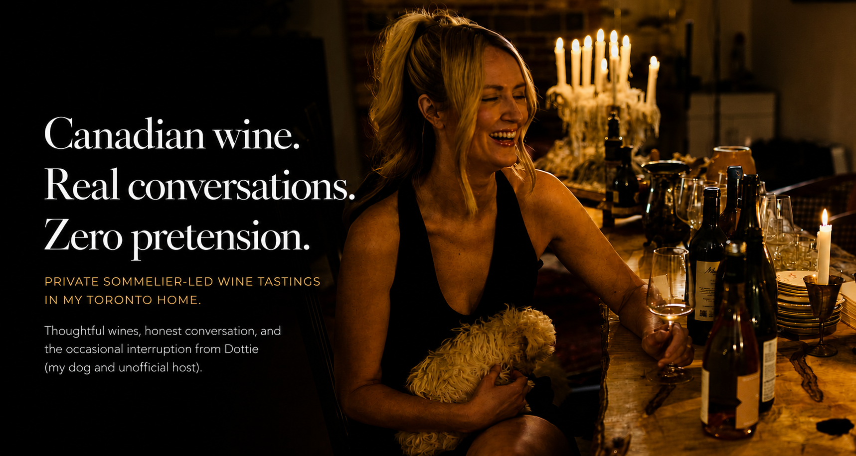 A woman laughing during a wine tasting, holding a glass of wine and surrounded by bottles and tasting notes, capturing a relaxed, social atmosphere centered on Canadian wine and shared enjoyment.