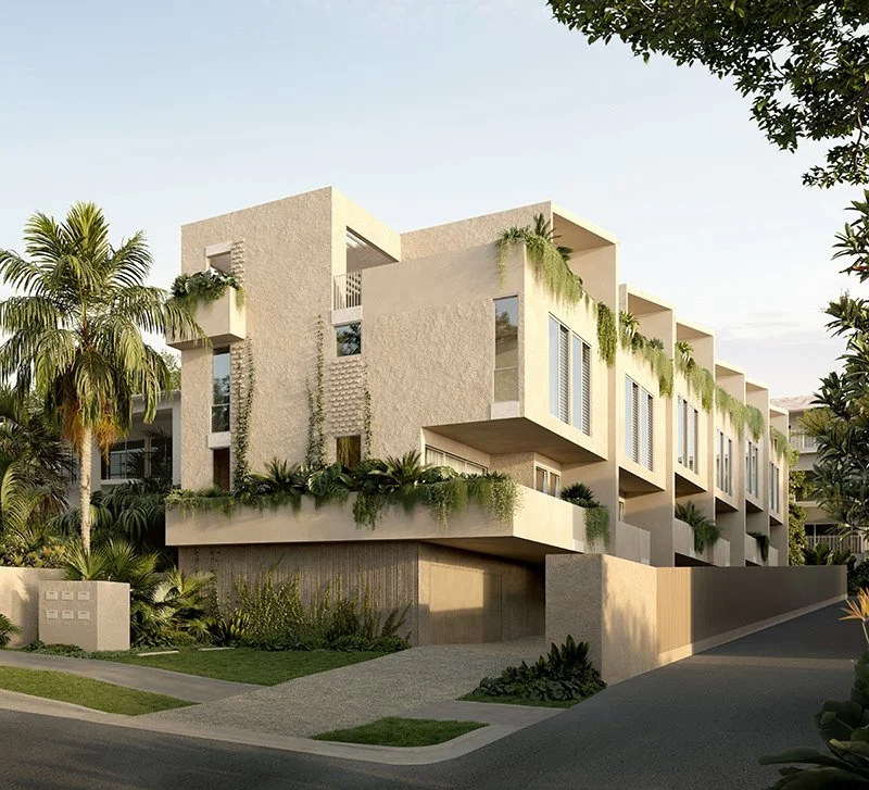 Modern multi-story residential building with clean, angular design, surrounded by palm trees and greenery in a suburban neighborhood.