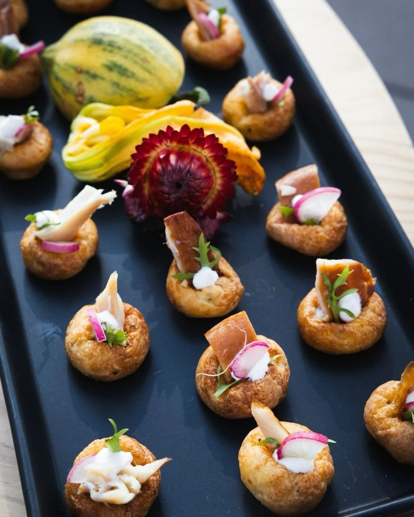A bite-sized burst of elegance: our Smoked Trout Goug&egrave;re, crafted to start the evening with a little awe.
⠀⠀⠀⠀⠀⠀⠀⠀⠀
#sfcatering #catering #events