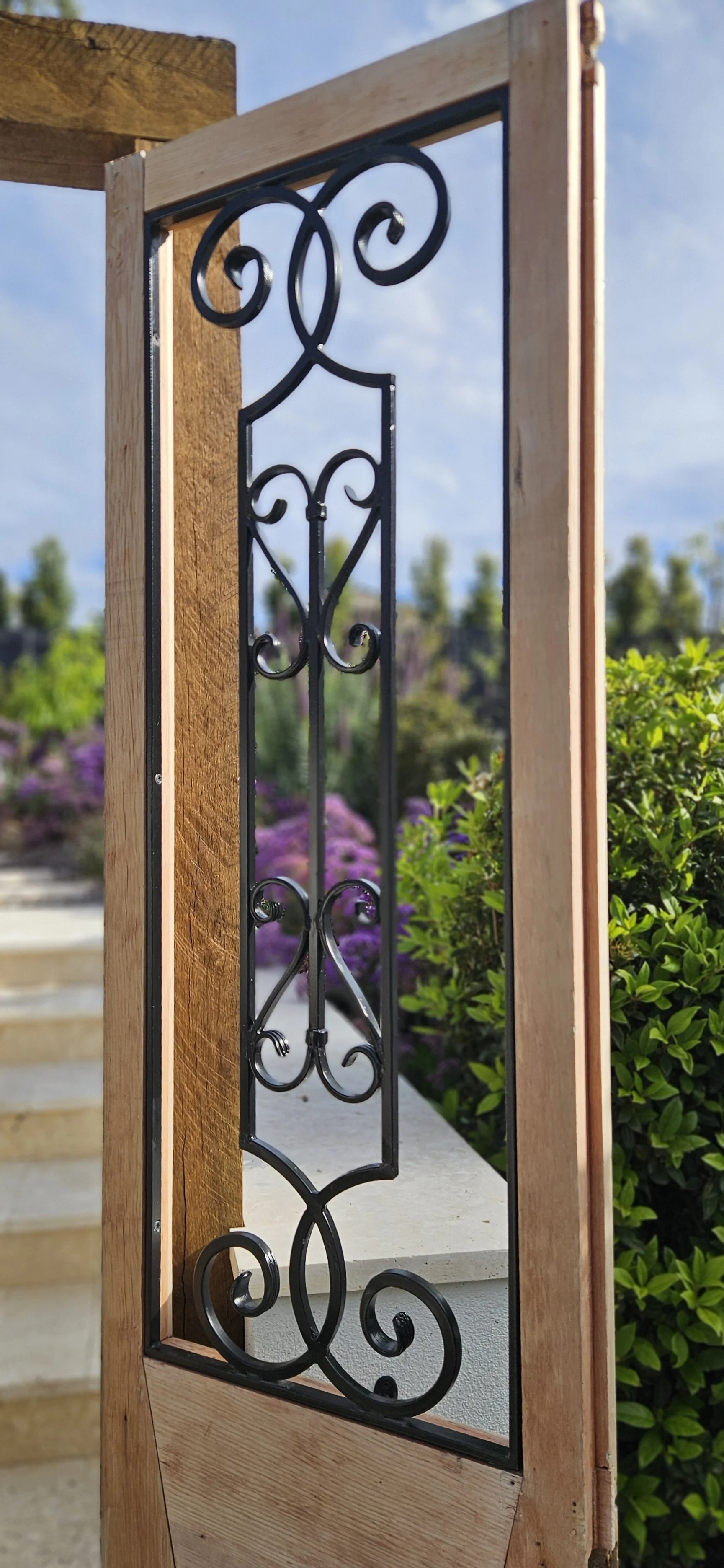 Wrought iron detail on garden gate