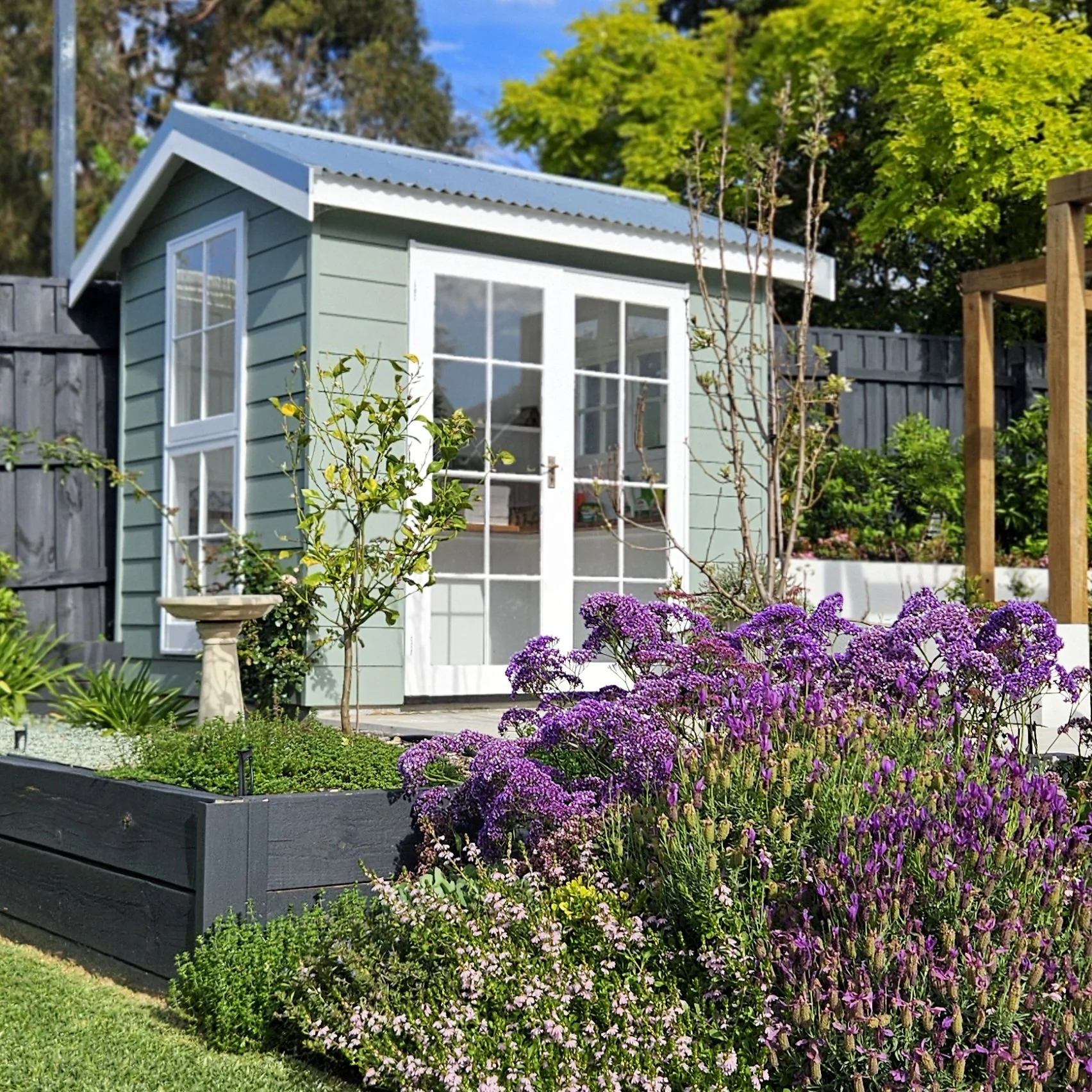 Cottage Gardening Shed using recycled doors and windows