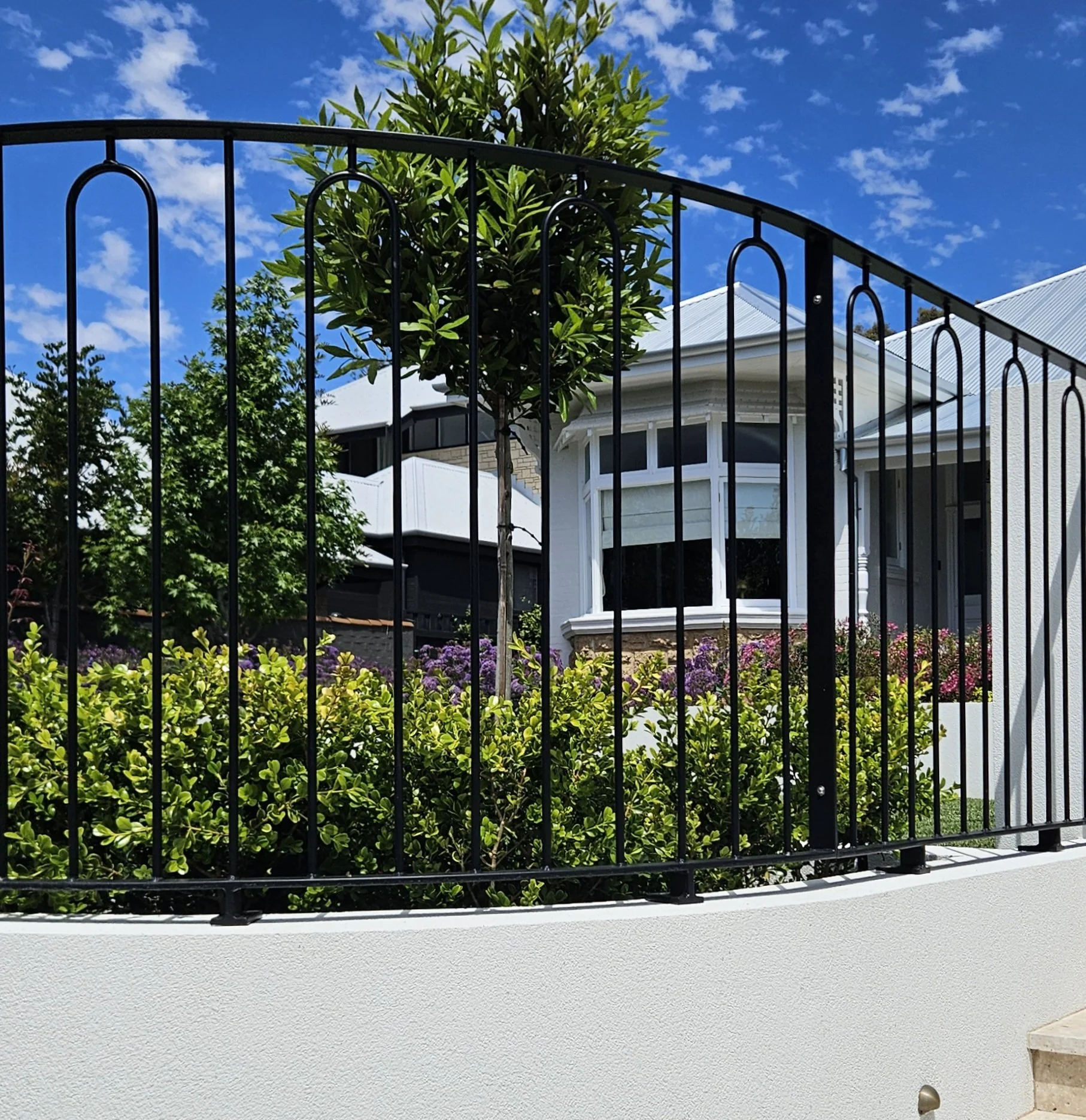 Decorative wrought iron fence
