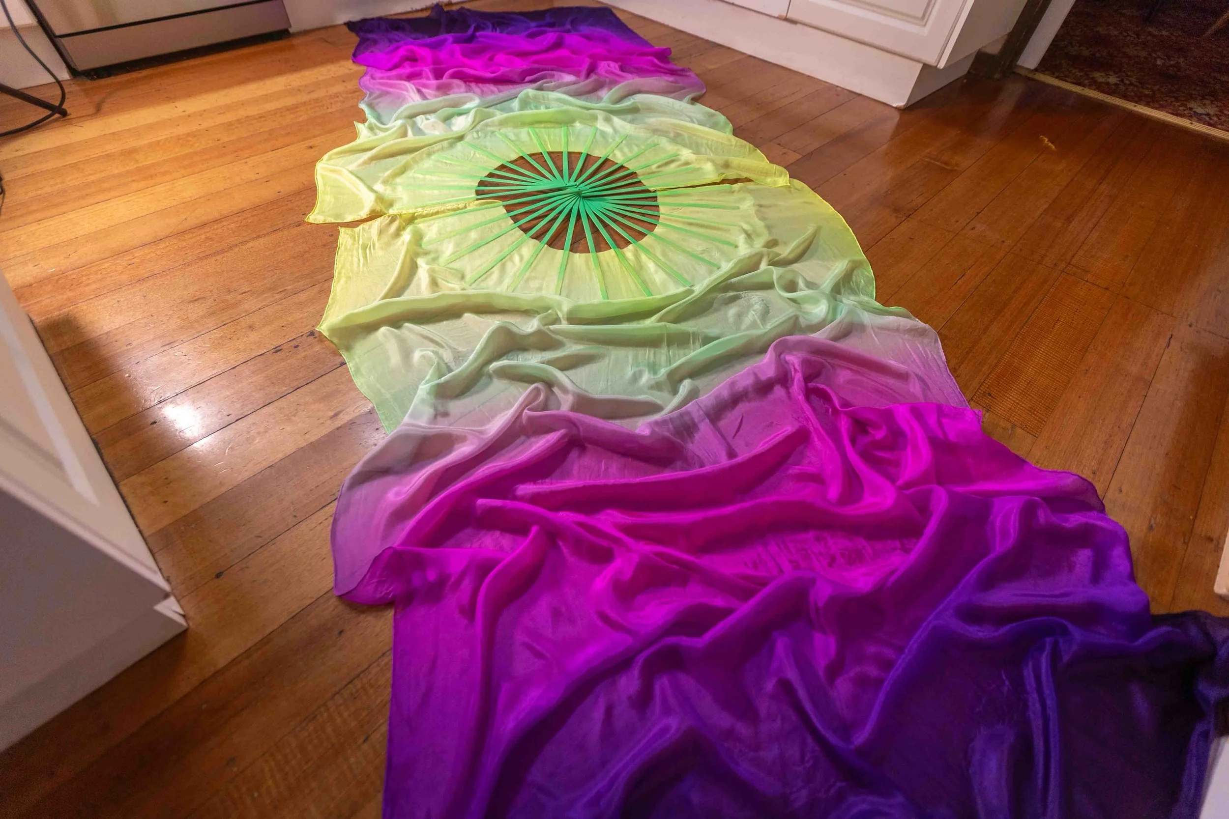 These &lsquo;Aurora Australis&rsquo; UV Reactive Silk Fans with limited edition neon staves were part of my last release - a variation spin on my loved &lsquo;Witches Brew&rsquo; colour gradient. 

After a month spent in Bali, visiting beautiful loca
