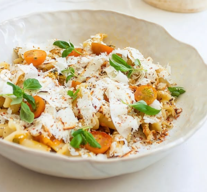 campanelle pasta with sungold tomato, ricotta salata & basil.png