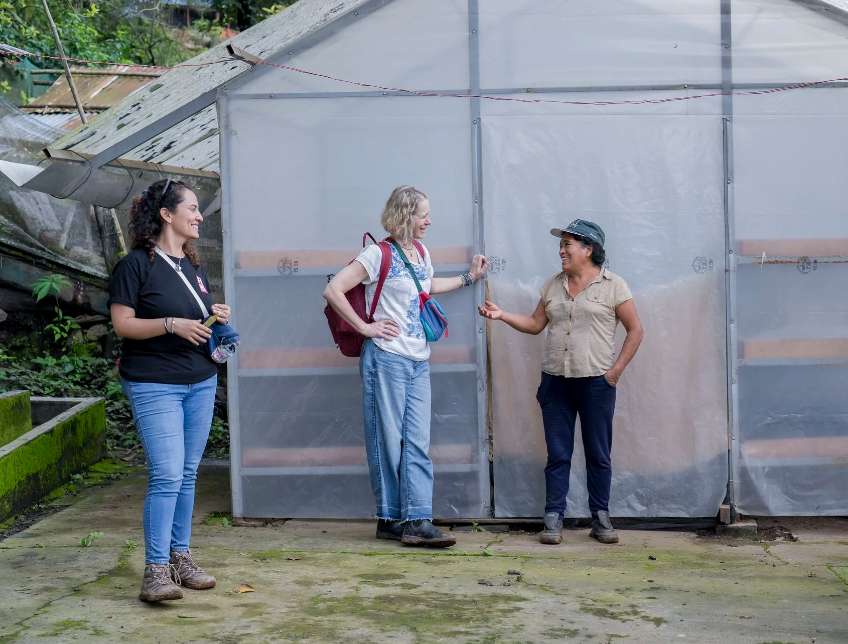 On Santos Florentina Lizana Laban’s farm with Paola (far left) and Beth Ann (center) from Equal Exchange