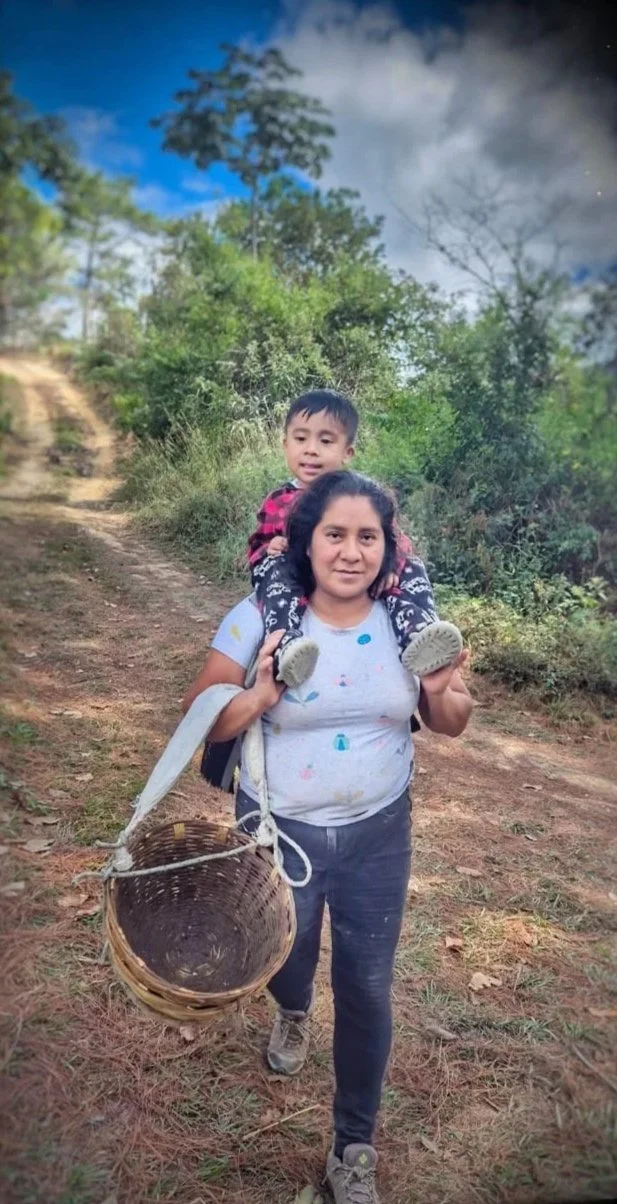 Elena Perez with her toddler in tow.