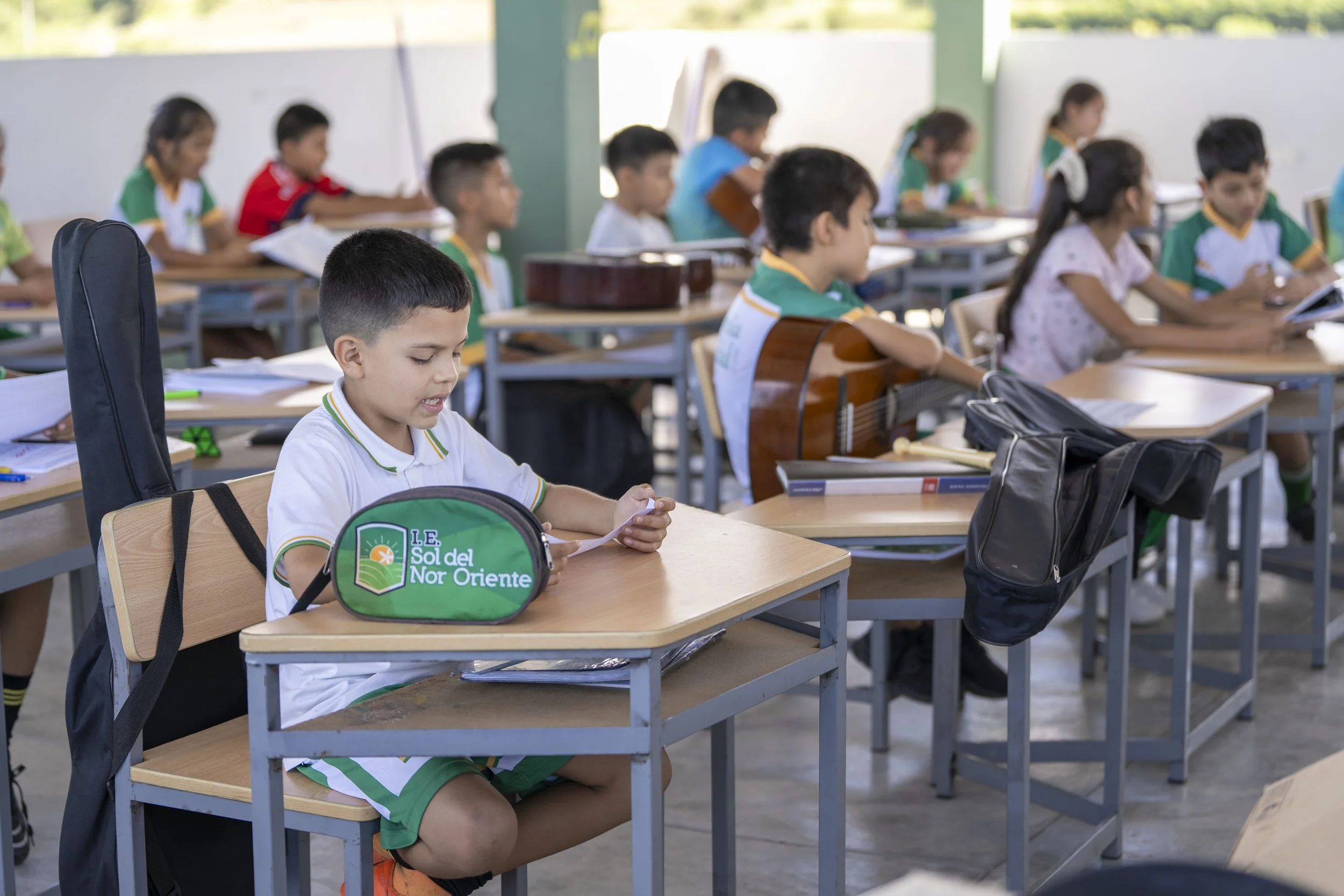 The co-op school combines standard Peruvian curriculum through a local, community-focused lens