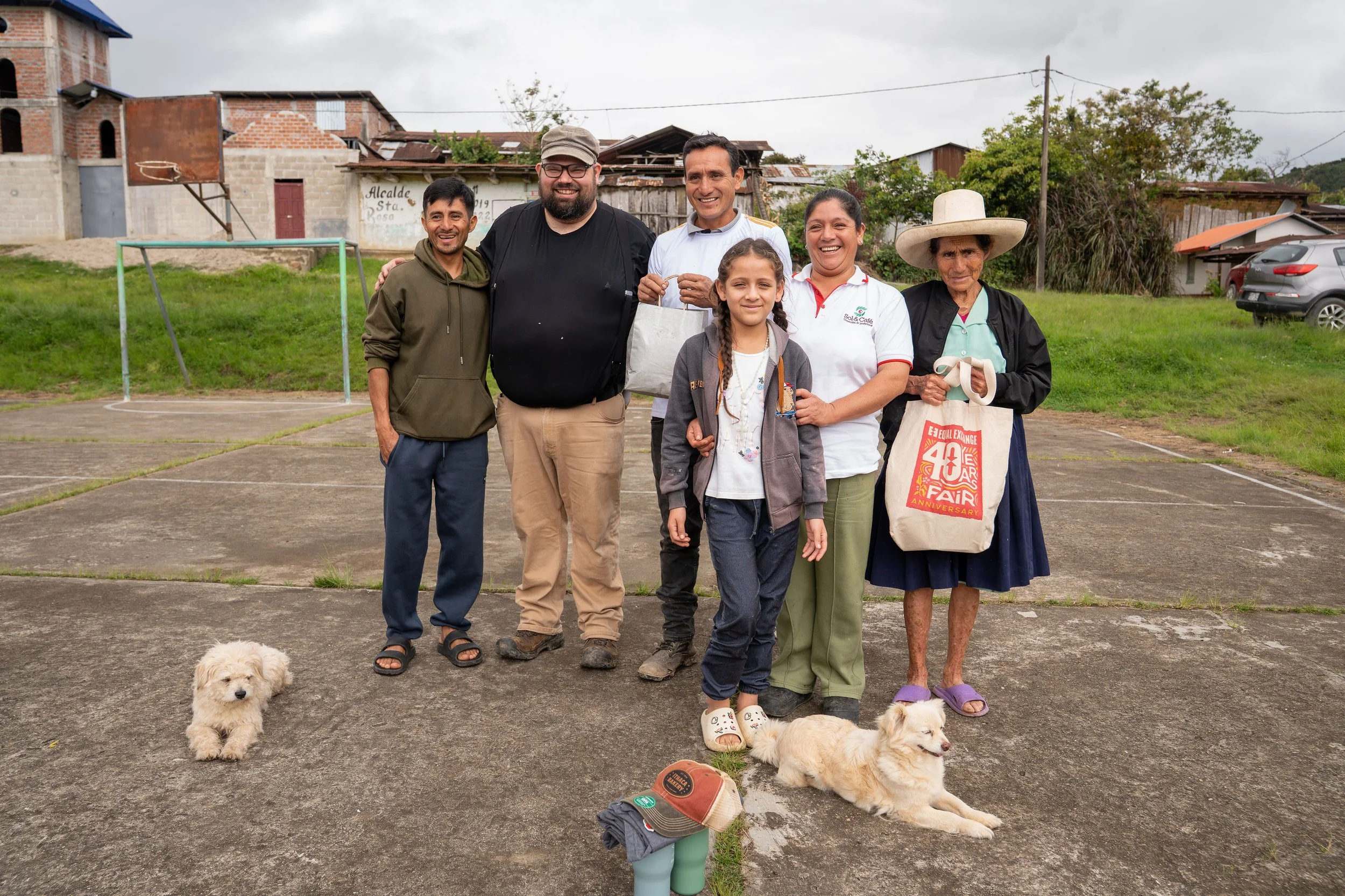 Gerardo’s family, alongside visitor Evans Goff, from Belfast Co-op in Maine