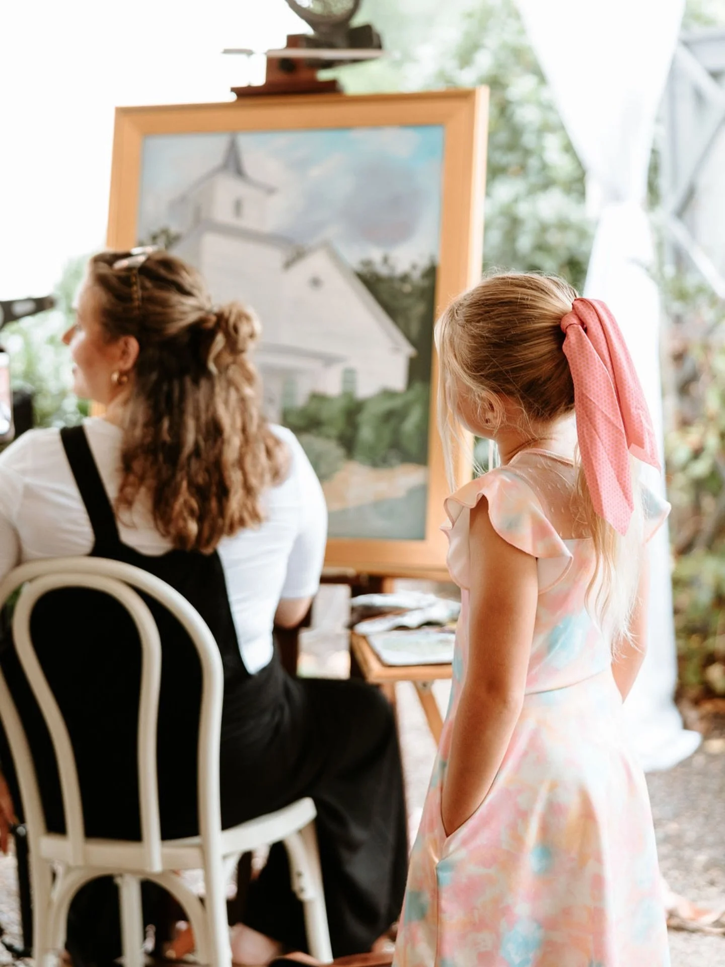 The wonder of a child watching an artist in real time! I love that I am not only able to capture such a wonderful moment for the bride and groom, but I am also able to inspire younger generations to chance their dreams!

Stunning picture!! @christian
