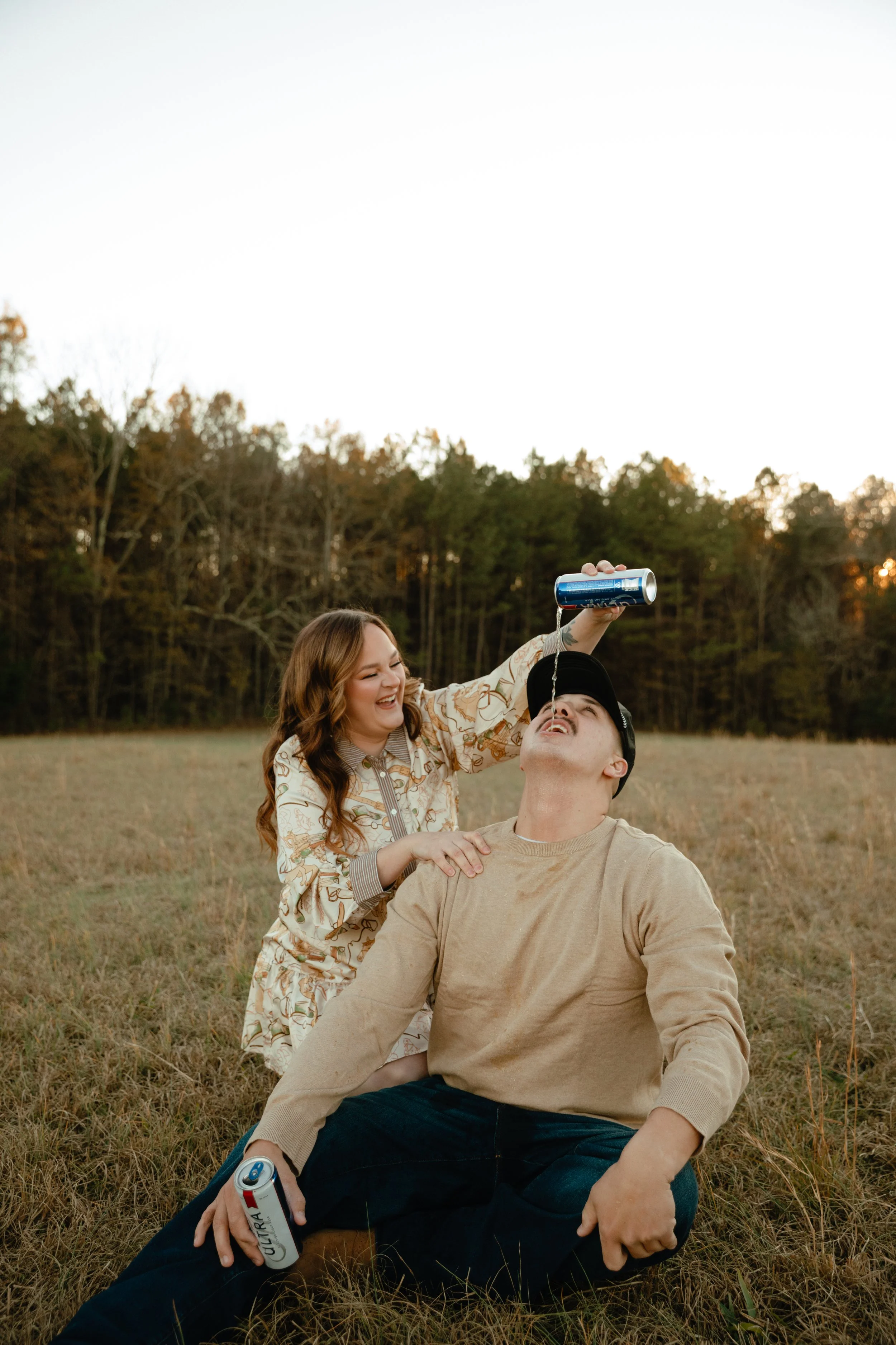 Alabama engagemnt session relaxed in a field