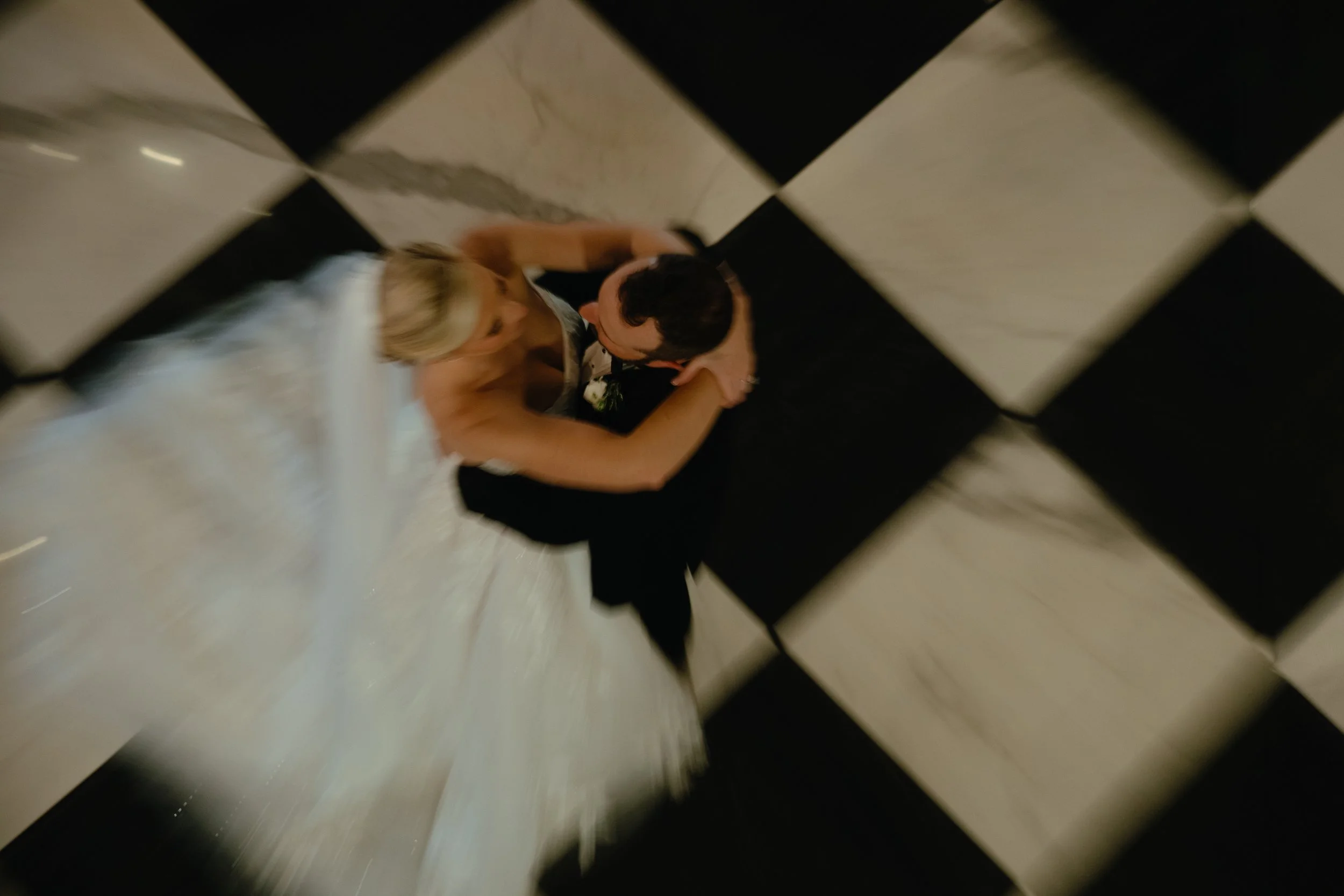 chattanooga tennessee elopement couple dancing on a black and white floor