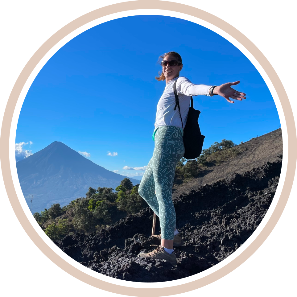 Local travel advisor Kristin standing on a mountain in Spain