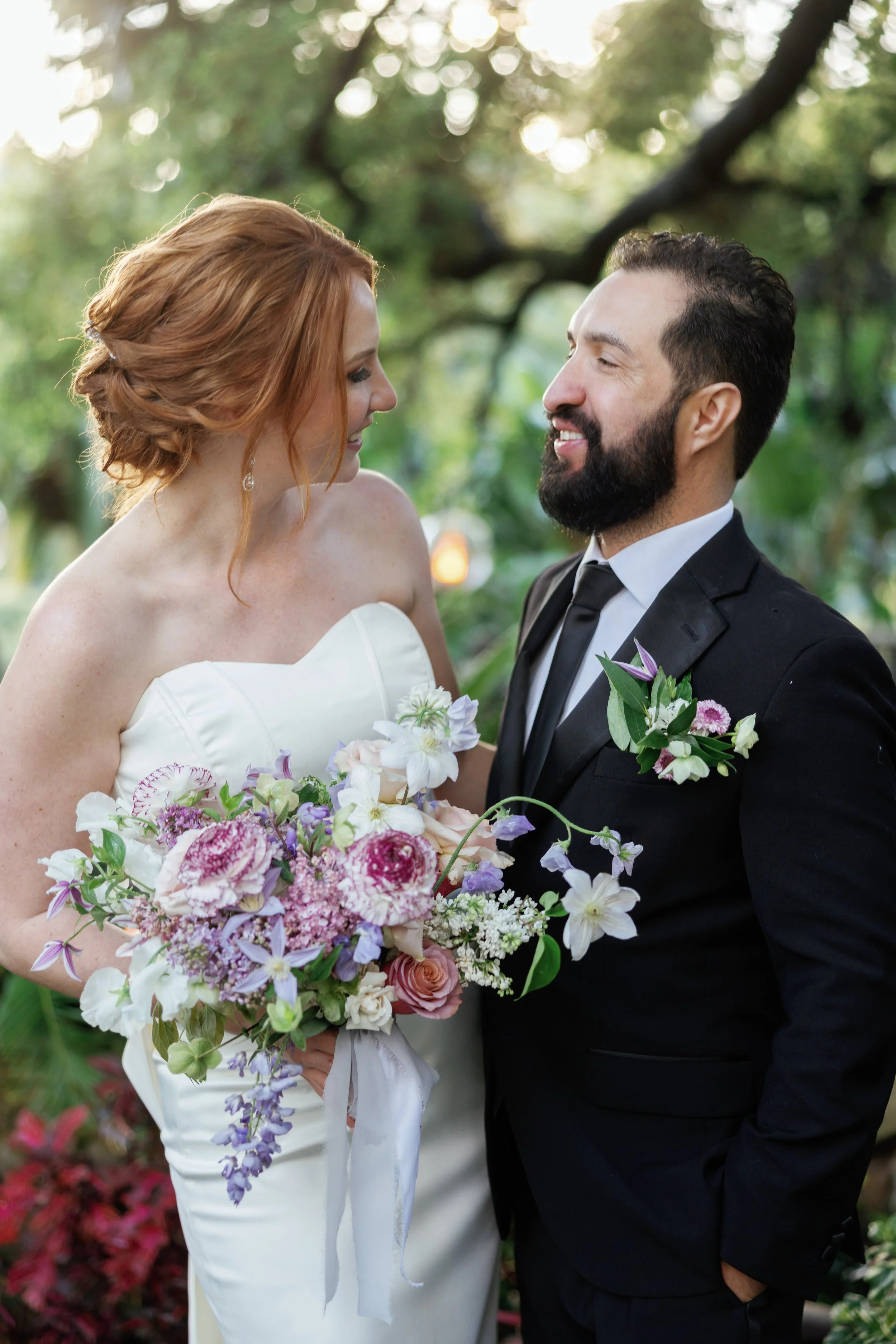 Couple sharing a quiet moment during high-end wedding day