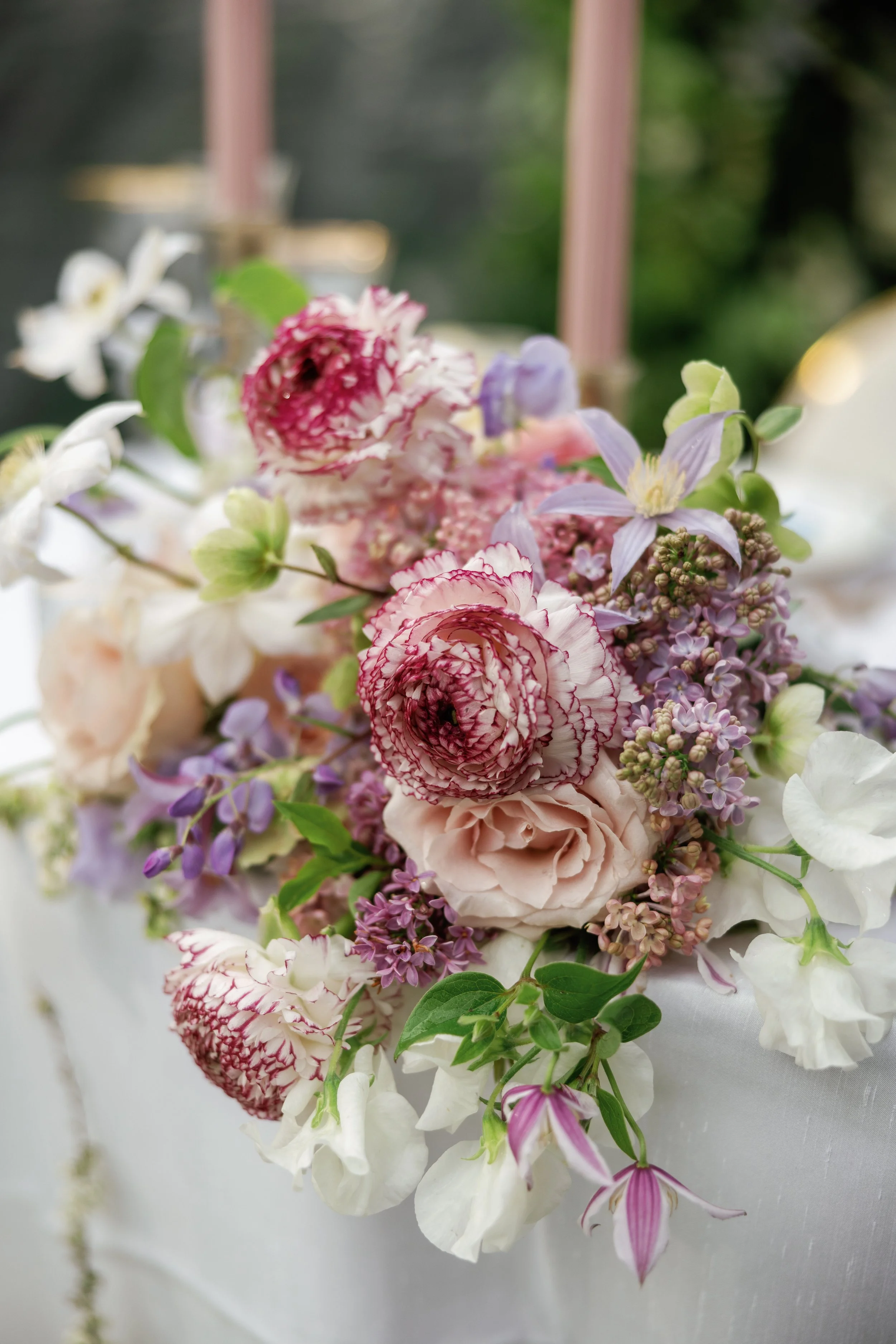 Bridal bouquet resting on table with refined floral design details
