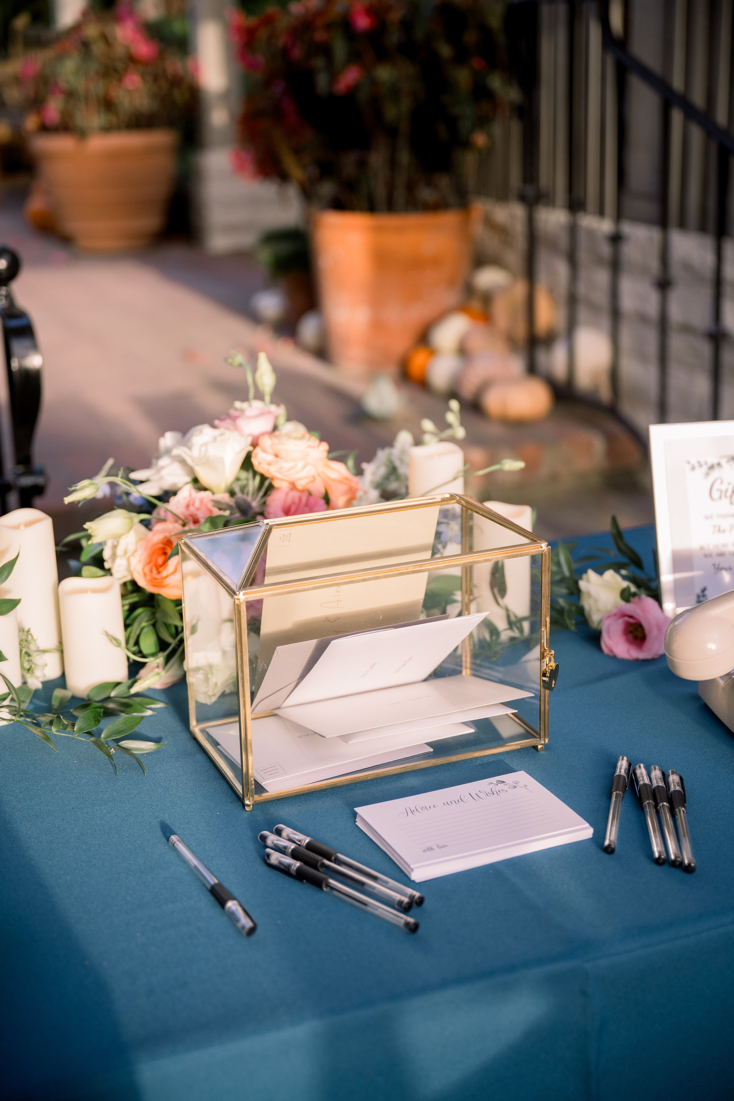 Elegant Wedding Card Table with Teal Linen and Floral Details