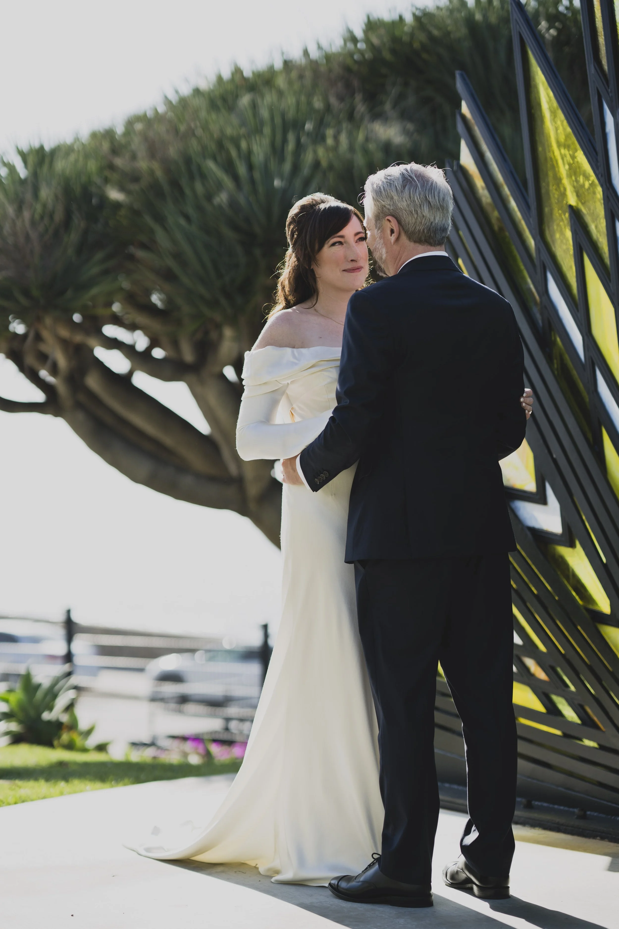 Bride walking toward the groom for a private first look before their destination wedding ceremony.