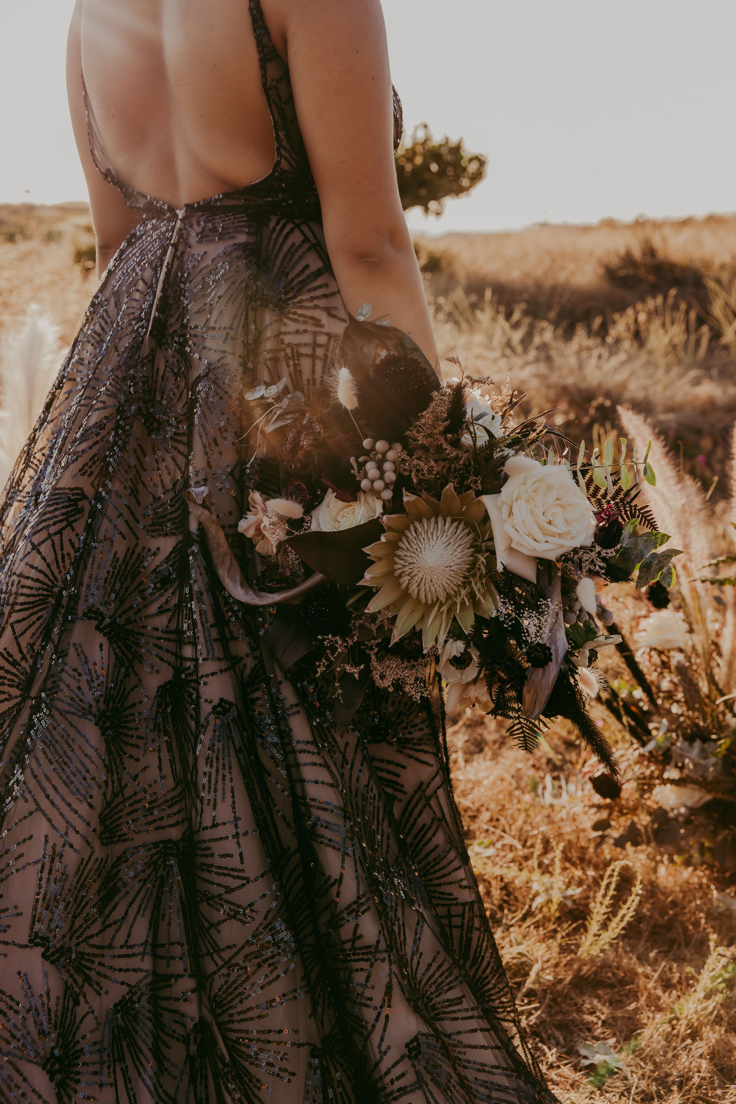 Alternative bride in a dark, nontraditional wedding dress