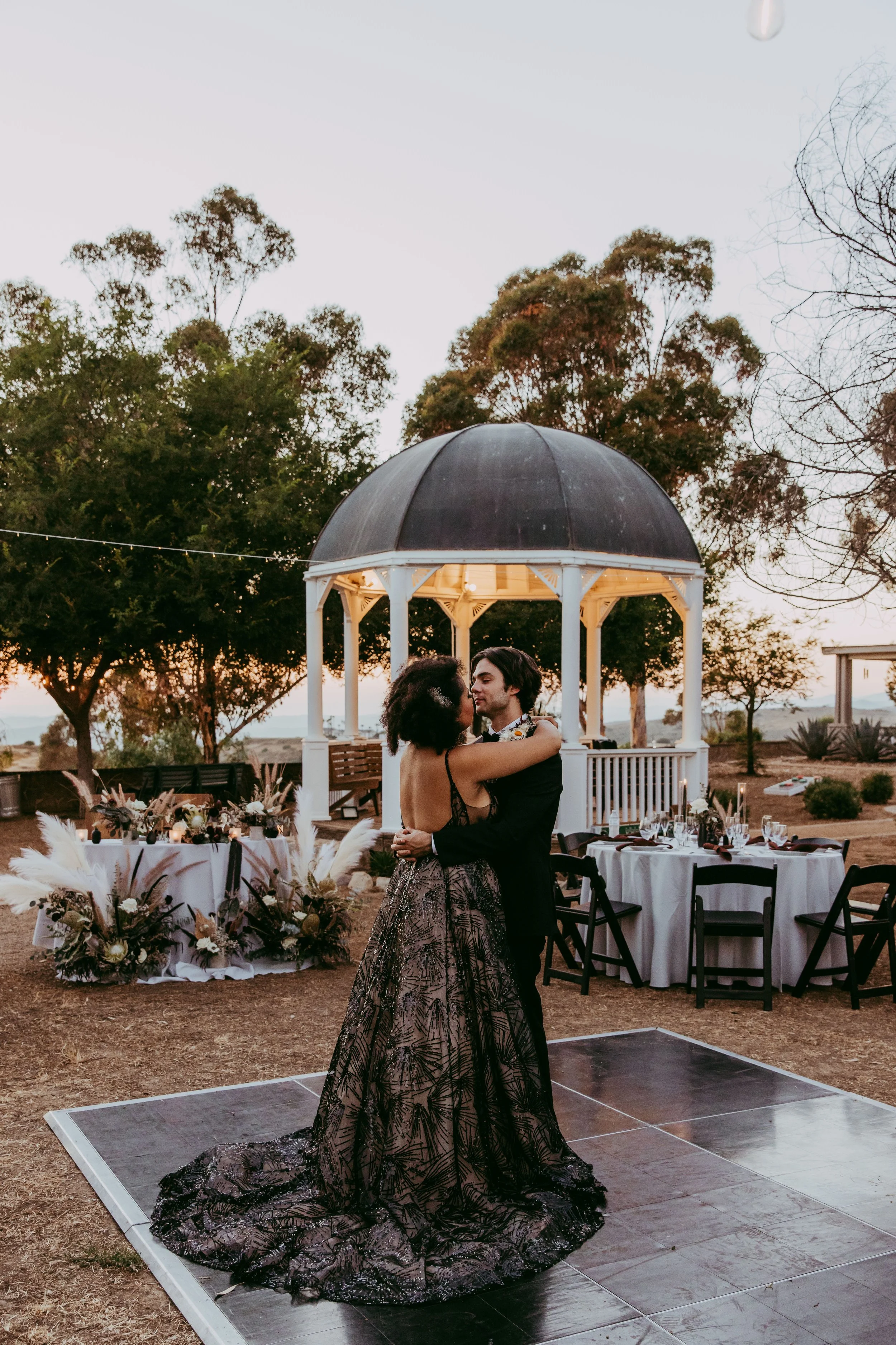Moody wedding lighting against the dry Utah mountains