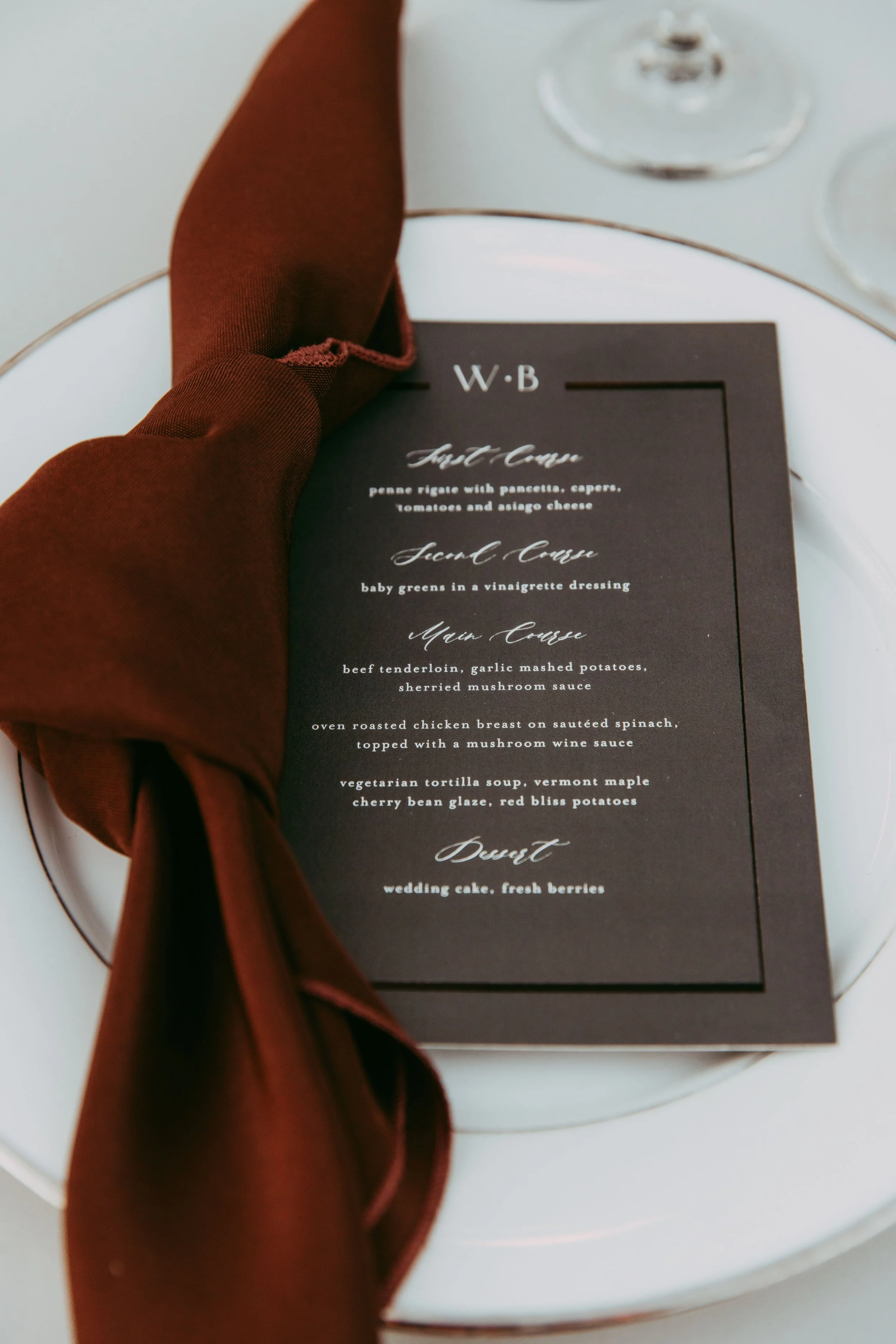Napkins styled to look like stone on a Disney villain wedding table
