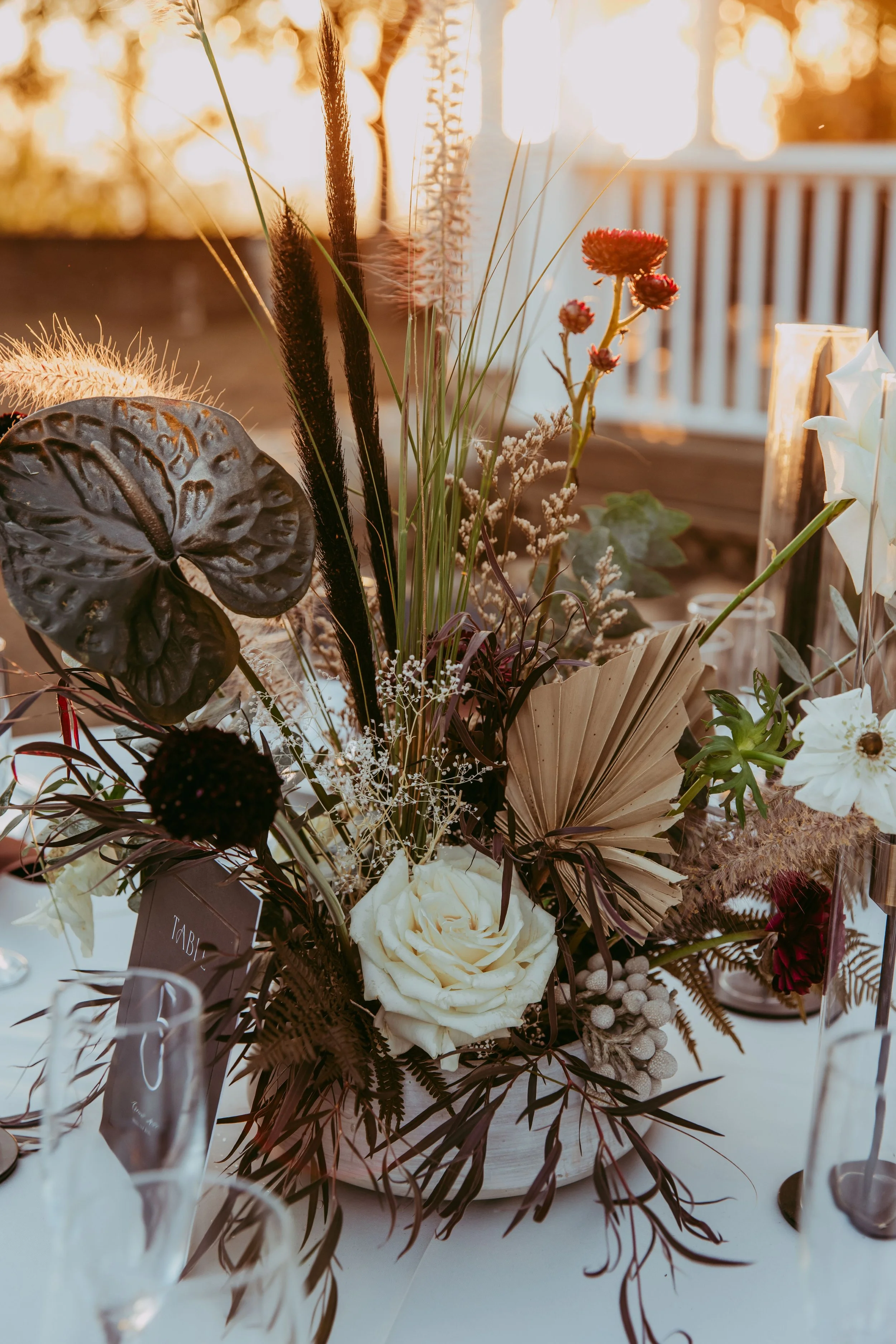 Close-up of dark dried floral details at a Disney villain wedding