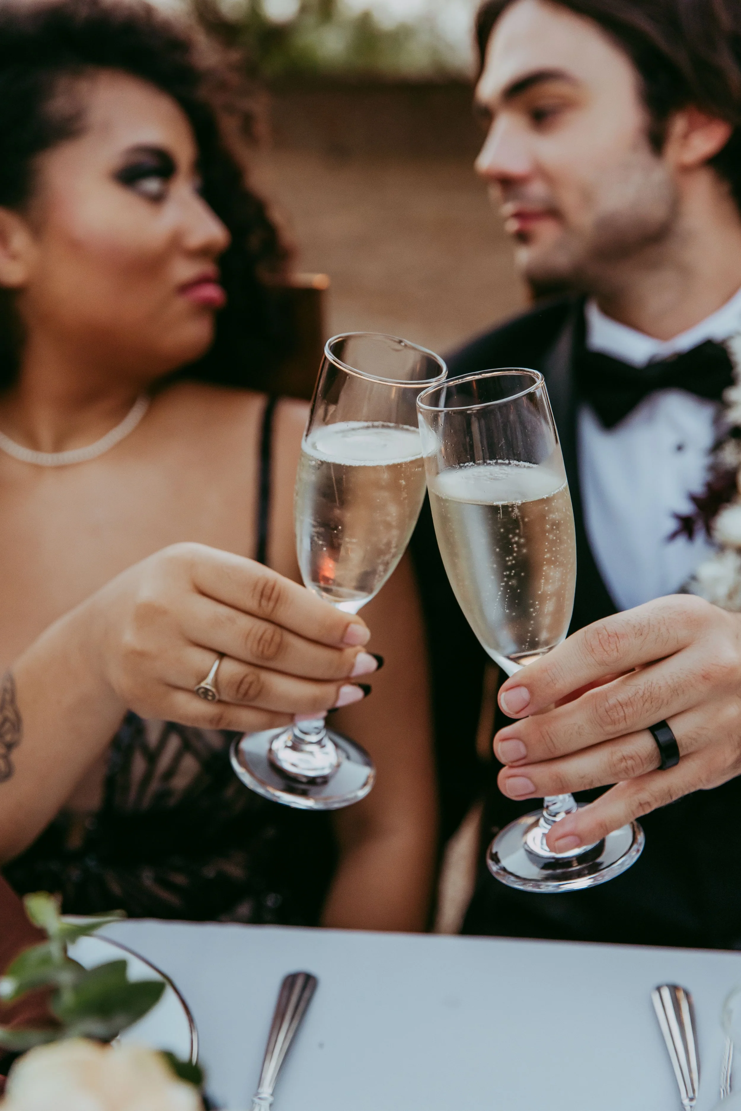 Villain-themed wedding couple photographed at golden hour in Utah