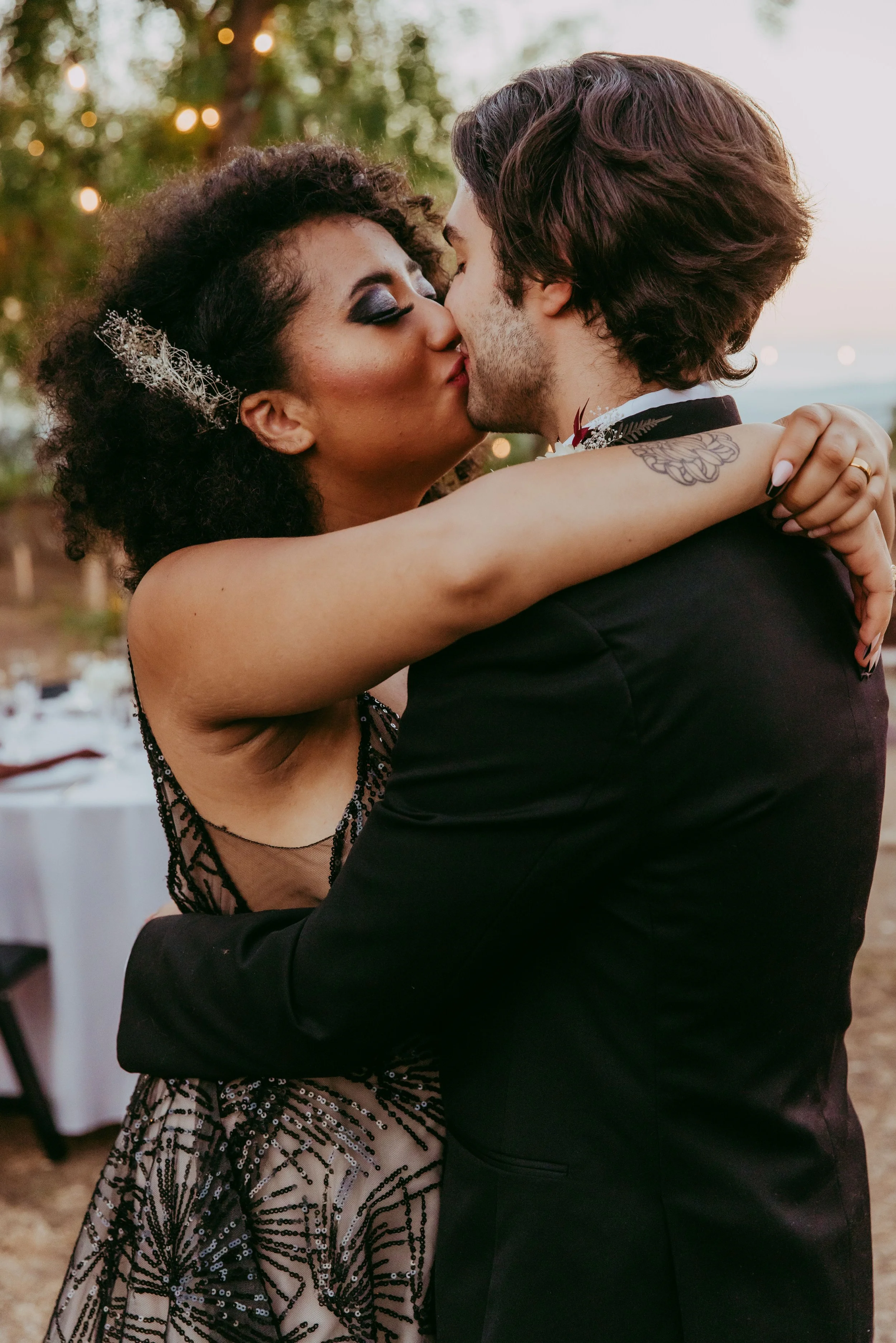 Scar-inspired groom menswear styled for a dark, alternative wedding