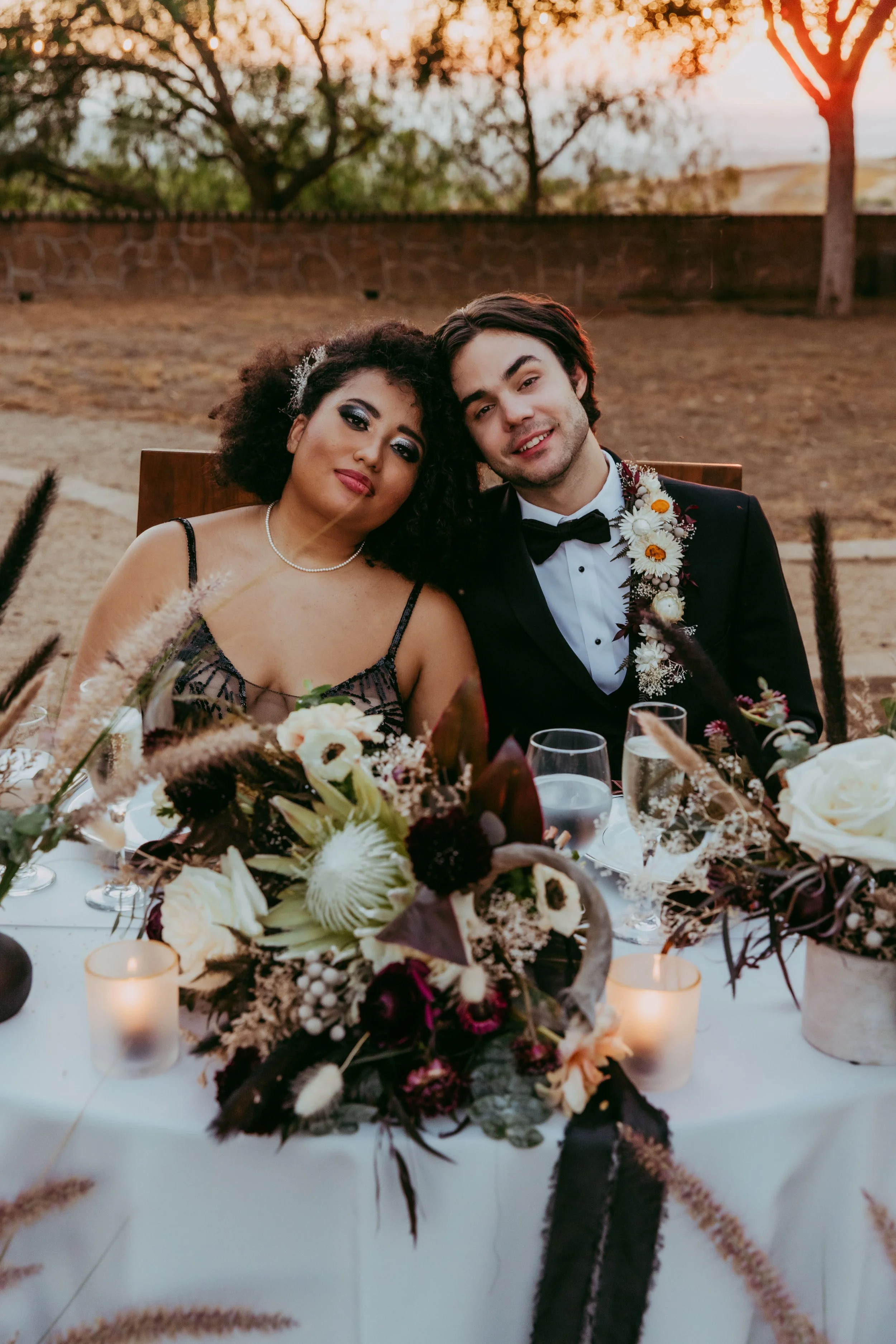 Dark, moody place setting for an alternative themed wedding