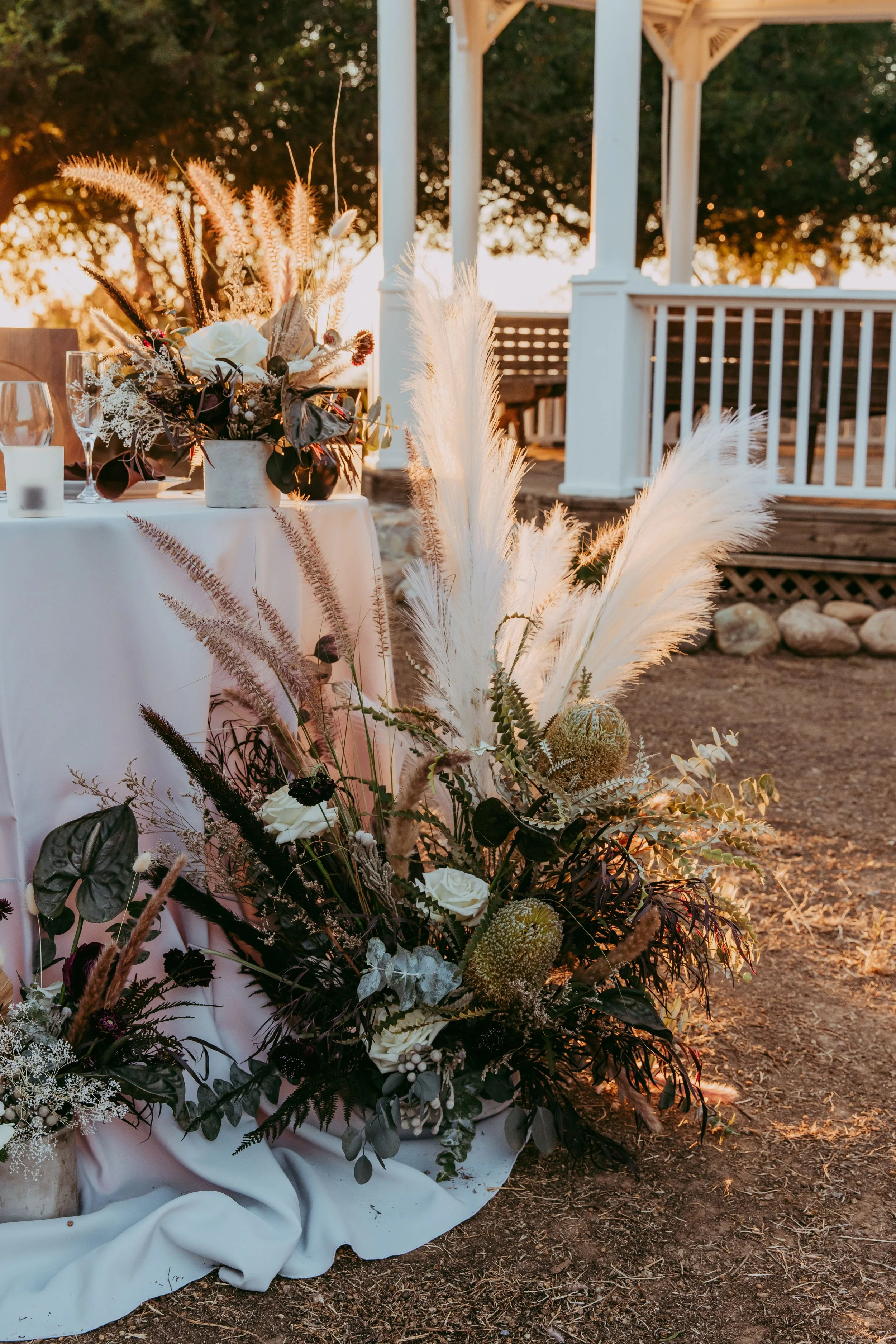 Moody wedding floral design using dried blooms and grasses in Utah