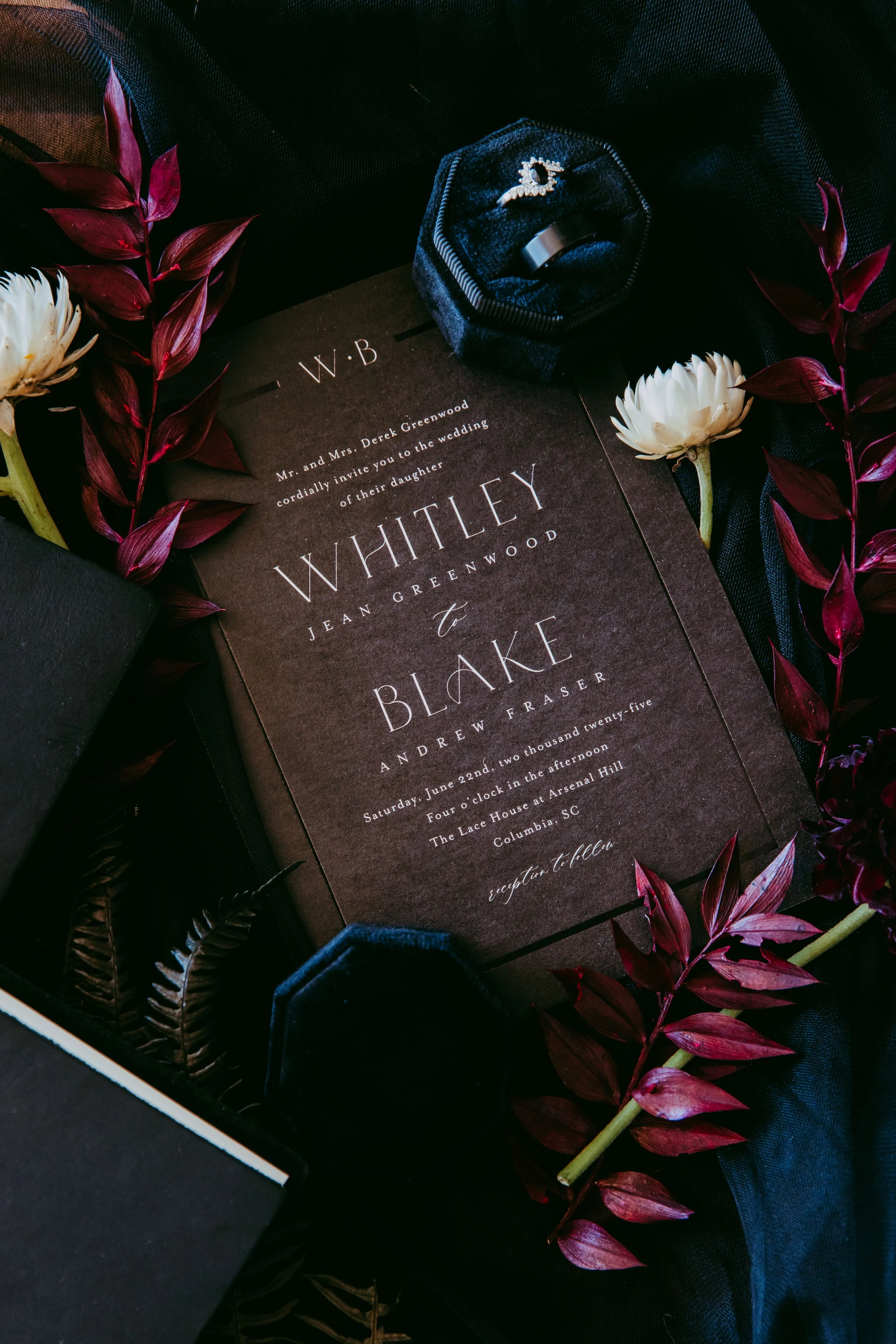 Dark, textural invitation suite for a Disney villain wedding