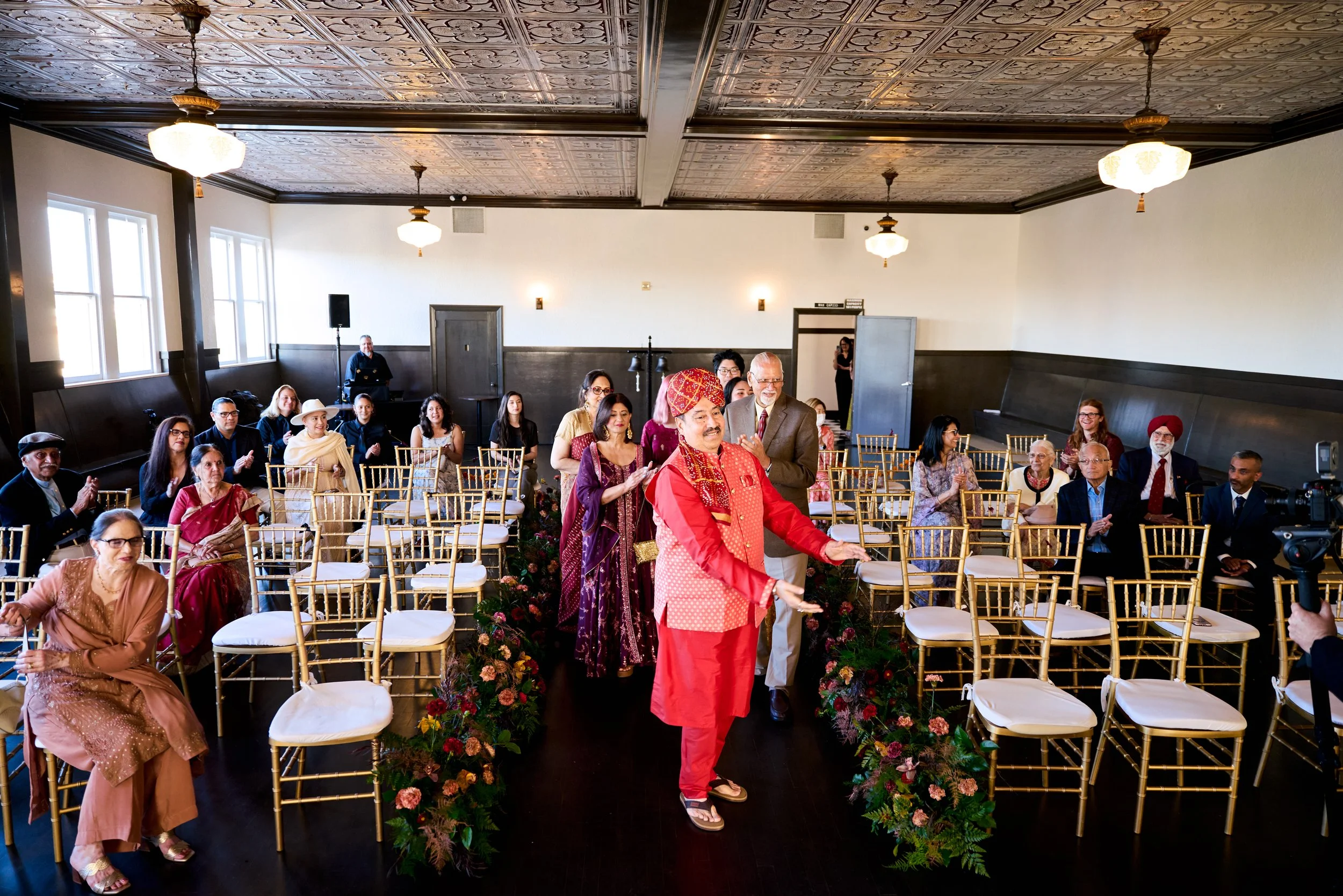 Groom's baraat procession arriving at a Hindu wedding in Utah