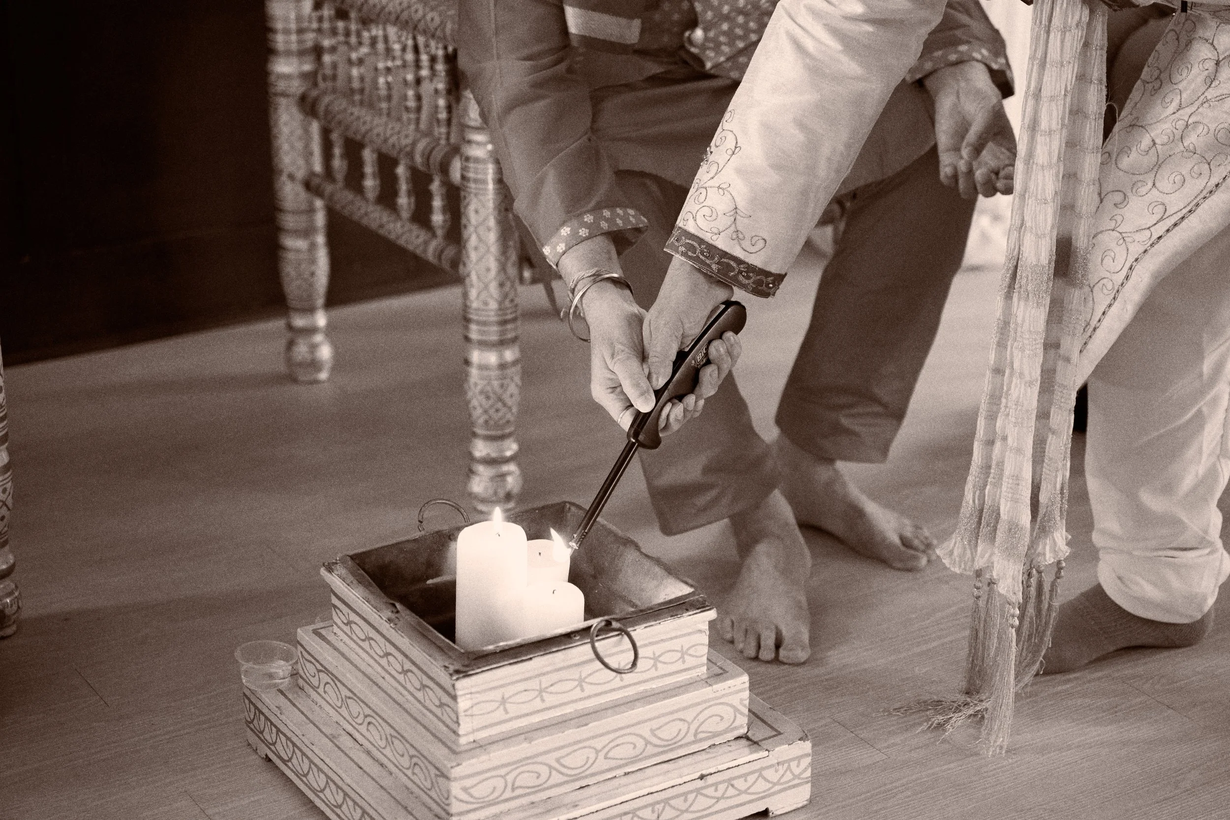 Indian wedding traditions taking place around the mandap fire