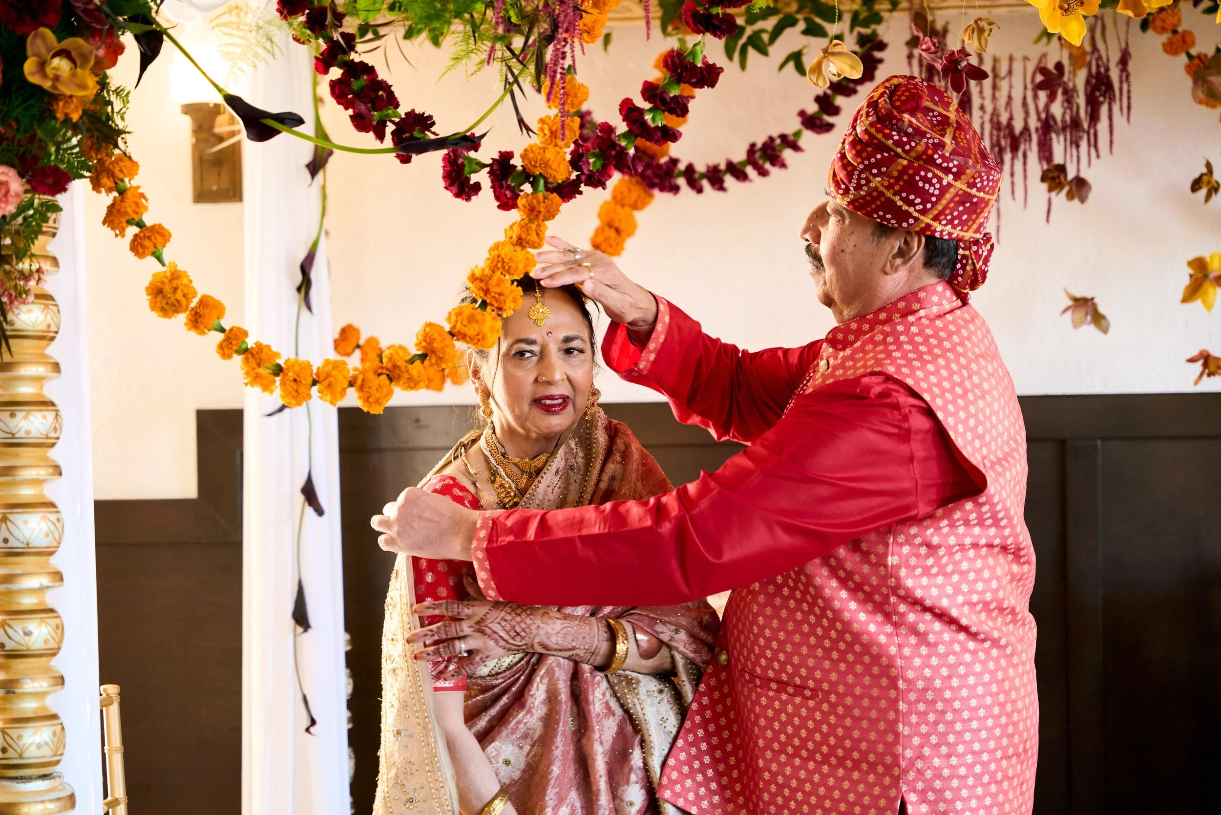 Pandit leading the couple through the Hindu wedding rituals