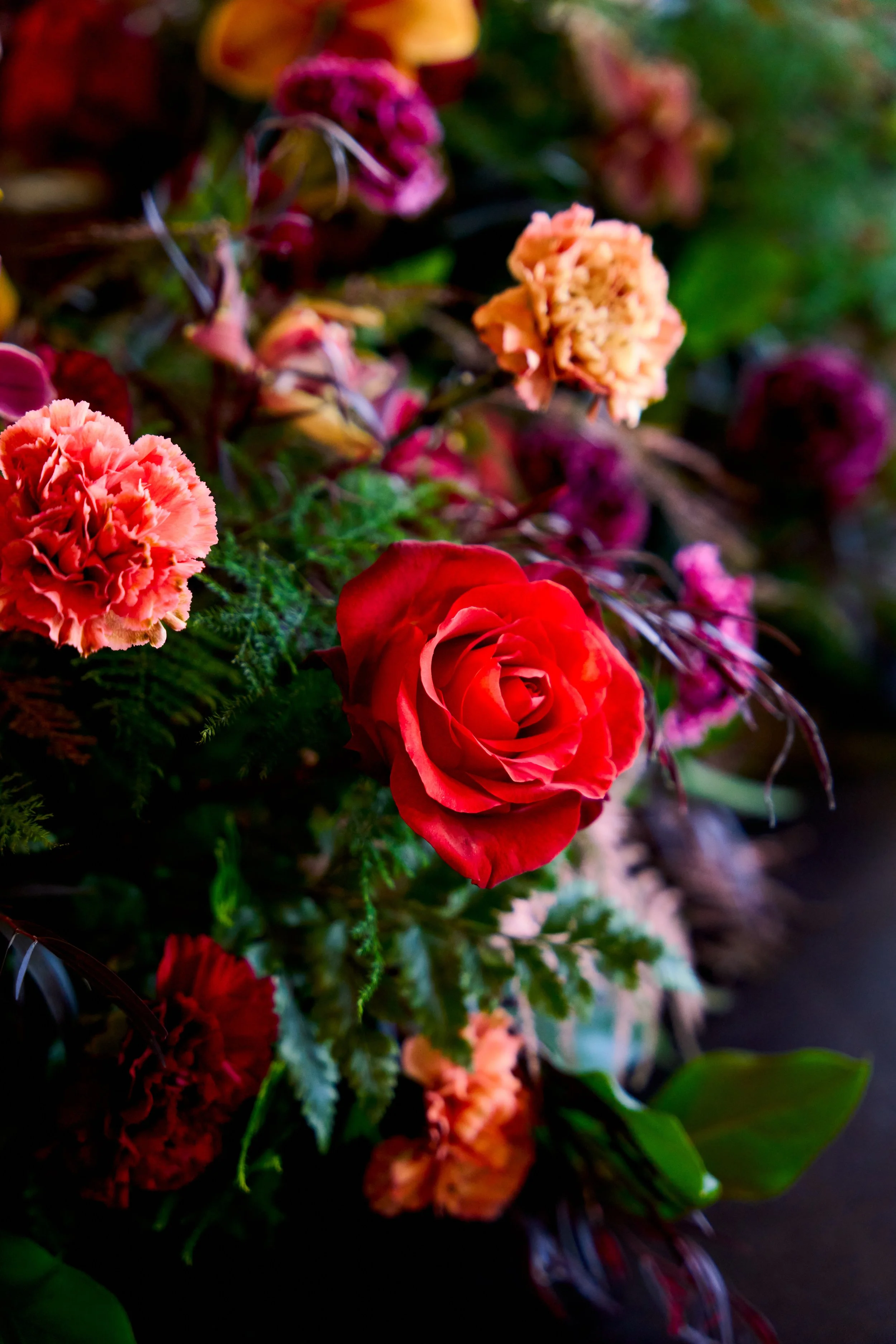 Floral and fabric decor dressing the mandap at a Hindu wedding