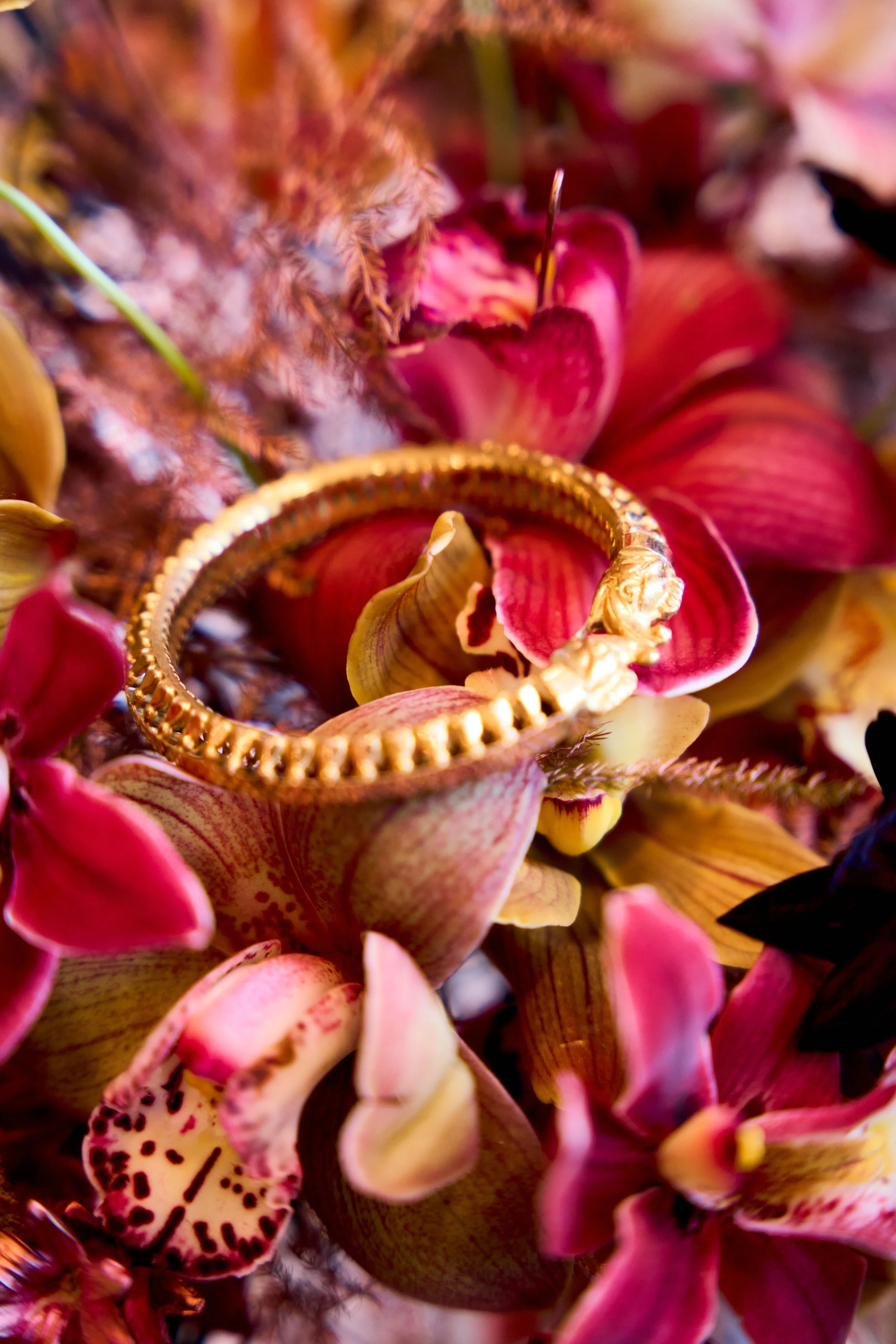 Deep red and marigold florals styled for a Hindu wedding