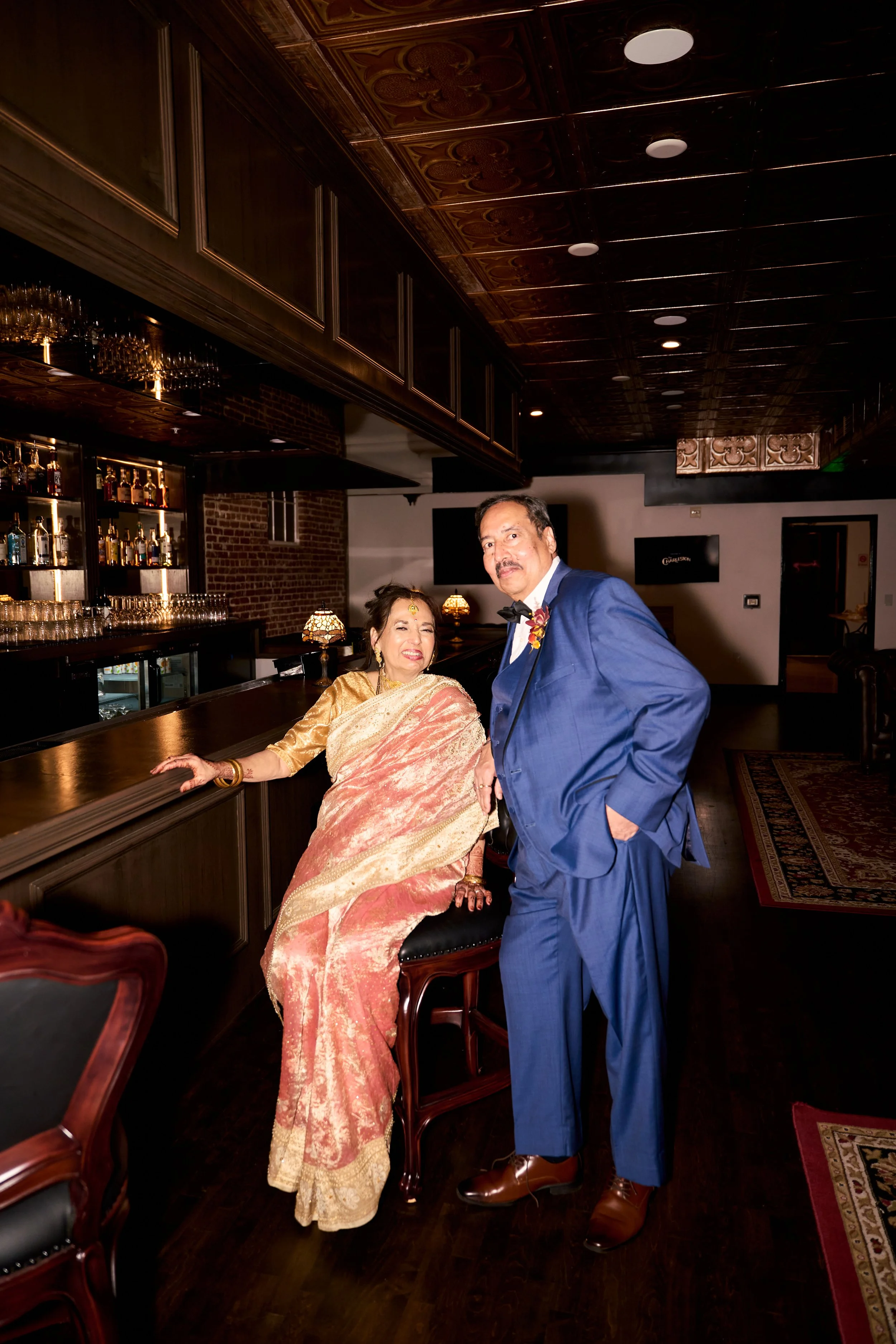 Family gathered to celebrate the couple at an Indian wedding