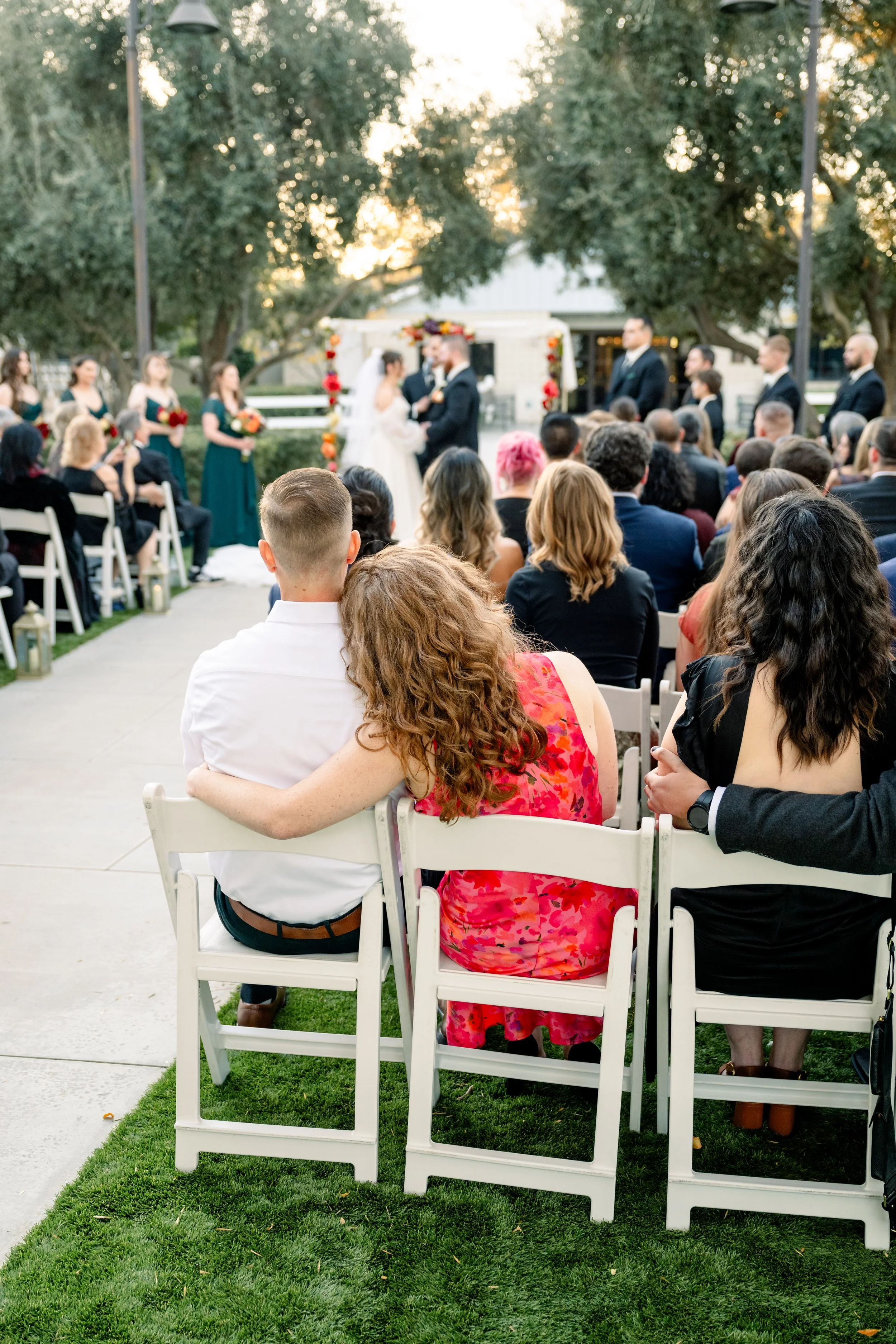 Guests seated at a fall wedding ceremony