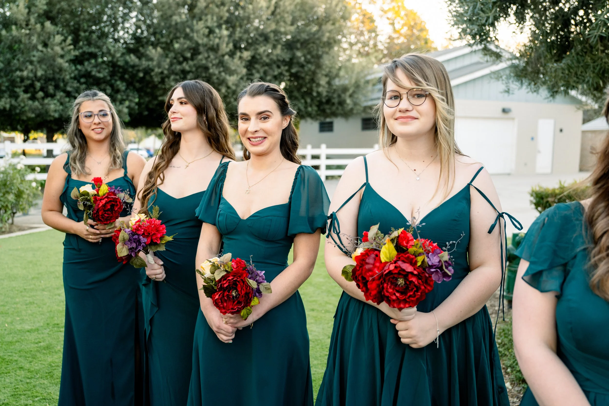 Bridesmaid dresses in deep teal for a fall wedding