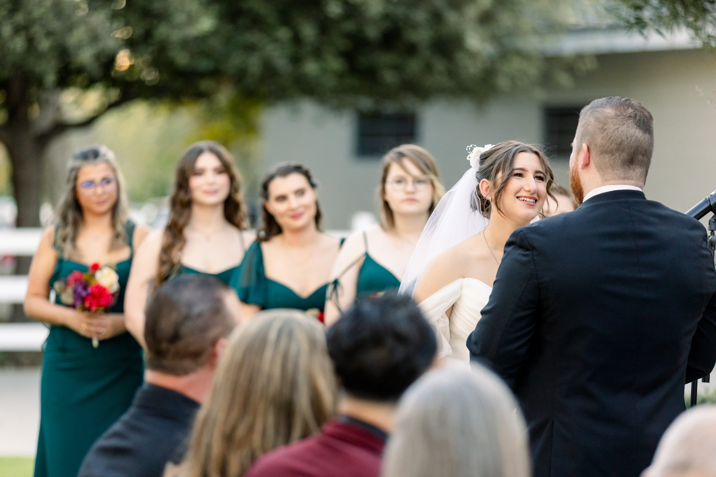 Fall wedding ceremony set against the autumn landscape