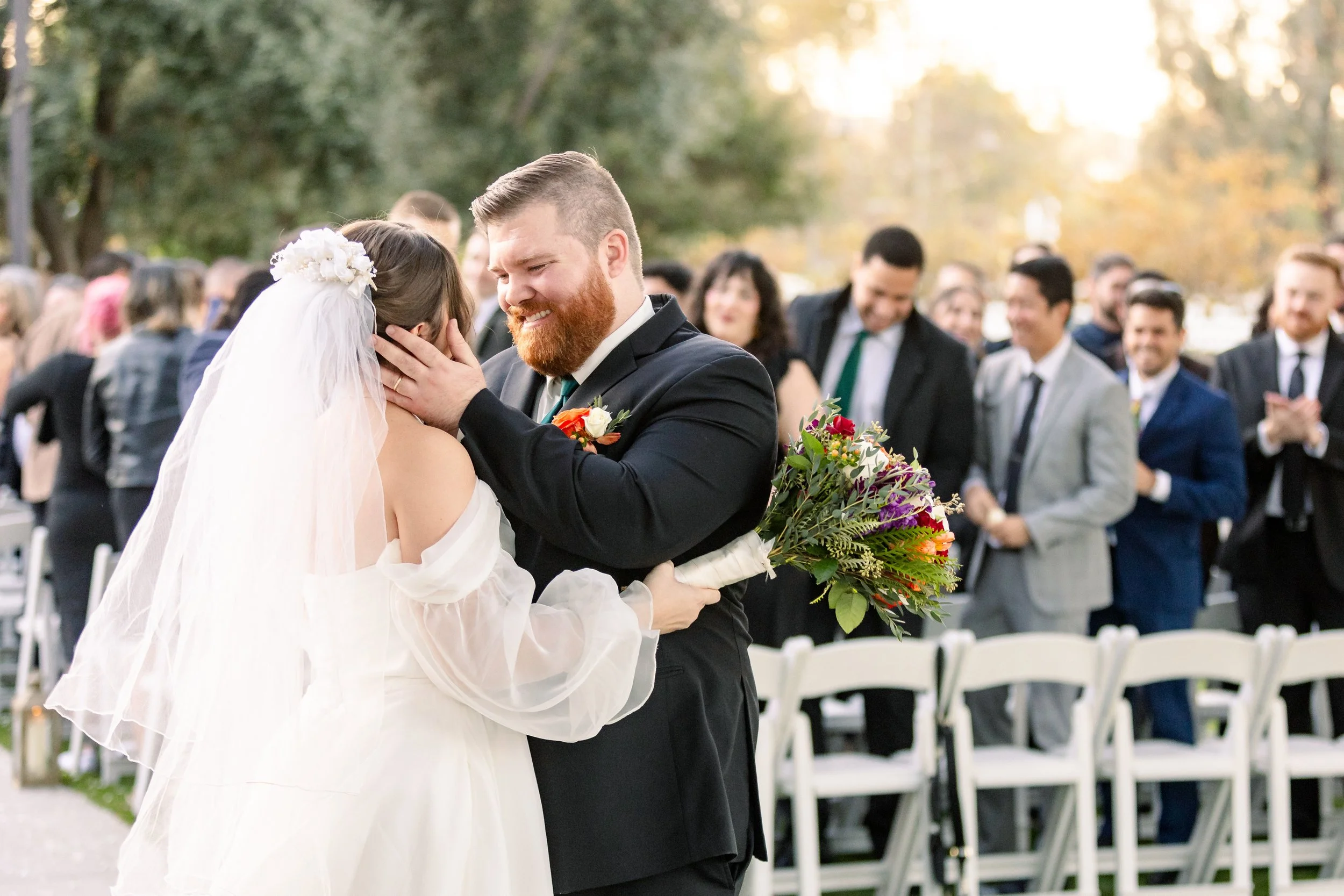 Outdoor October fall wedding ceremony surrounded by autumn color