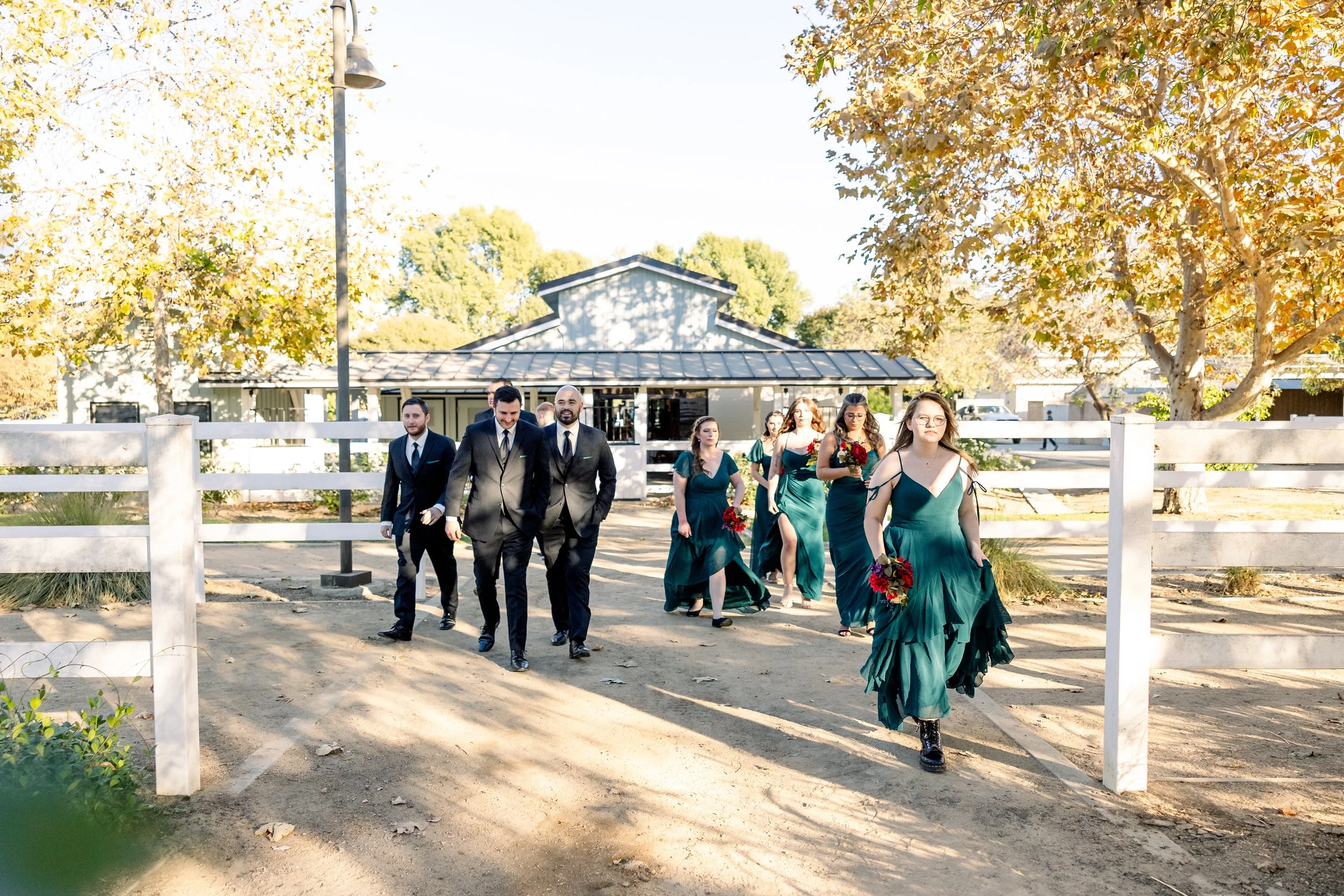 Bridal party in warm autumn wedding tones