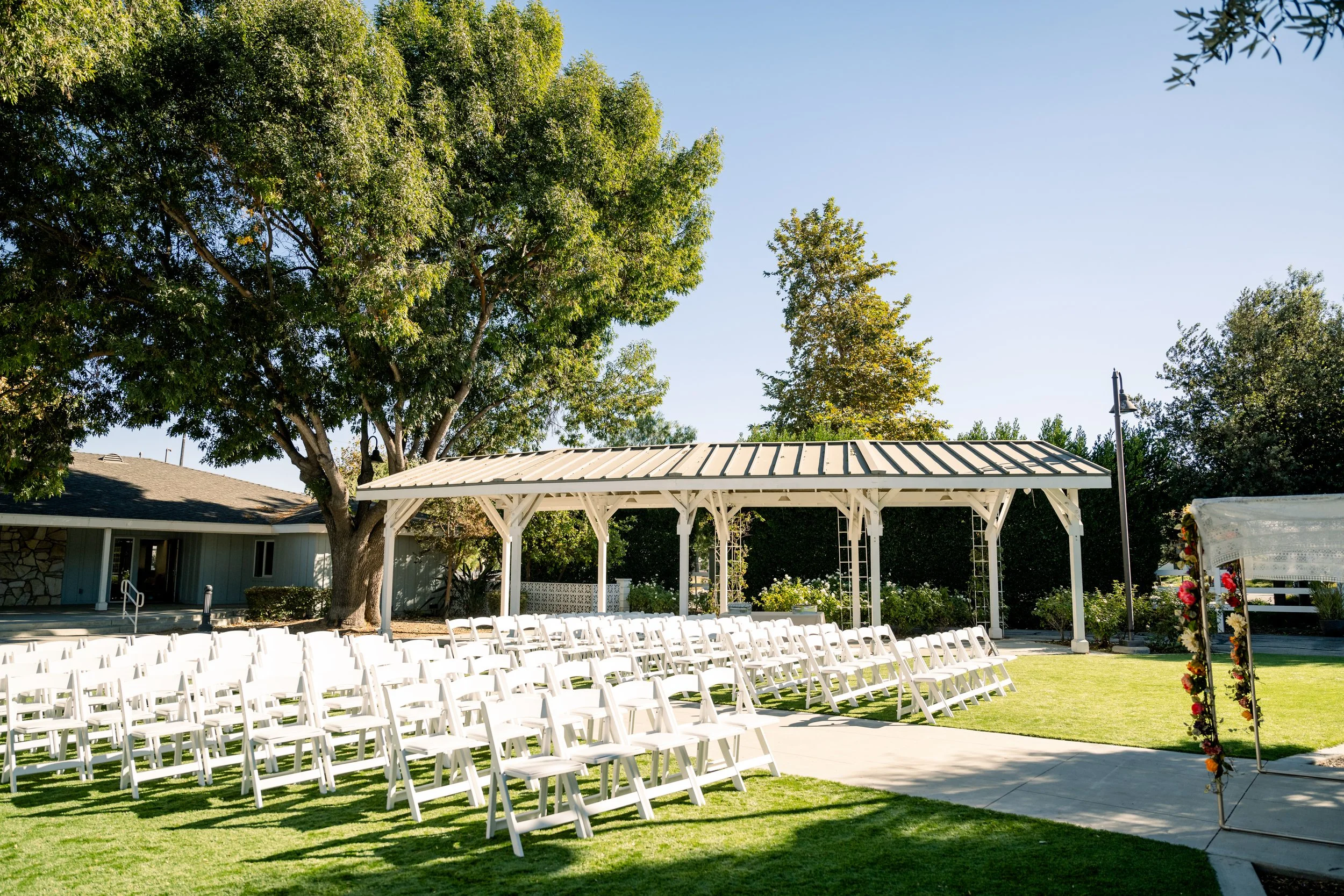 Fall wedding ceremony in warm burnt orange and gold tones