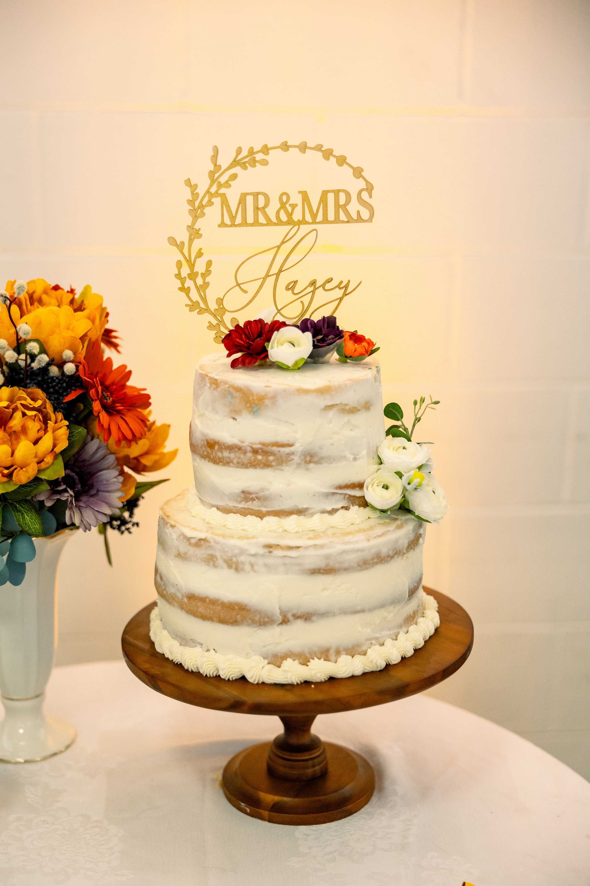 Wedding cake styled in warm fall tones