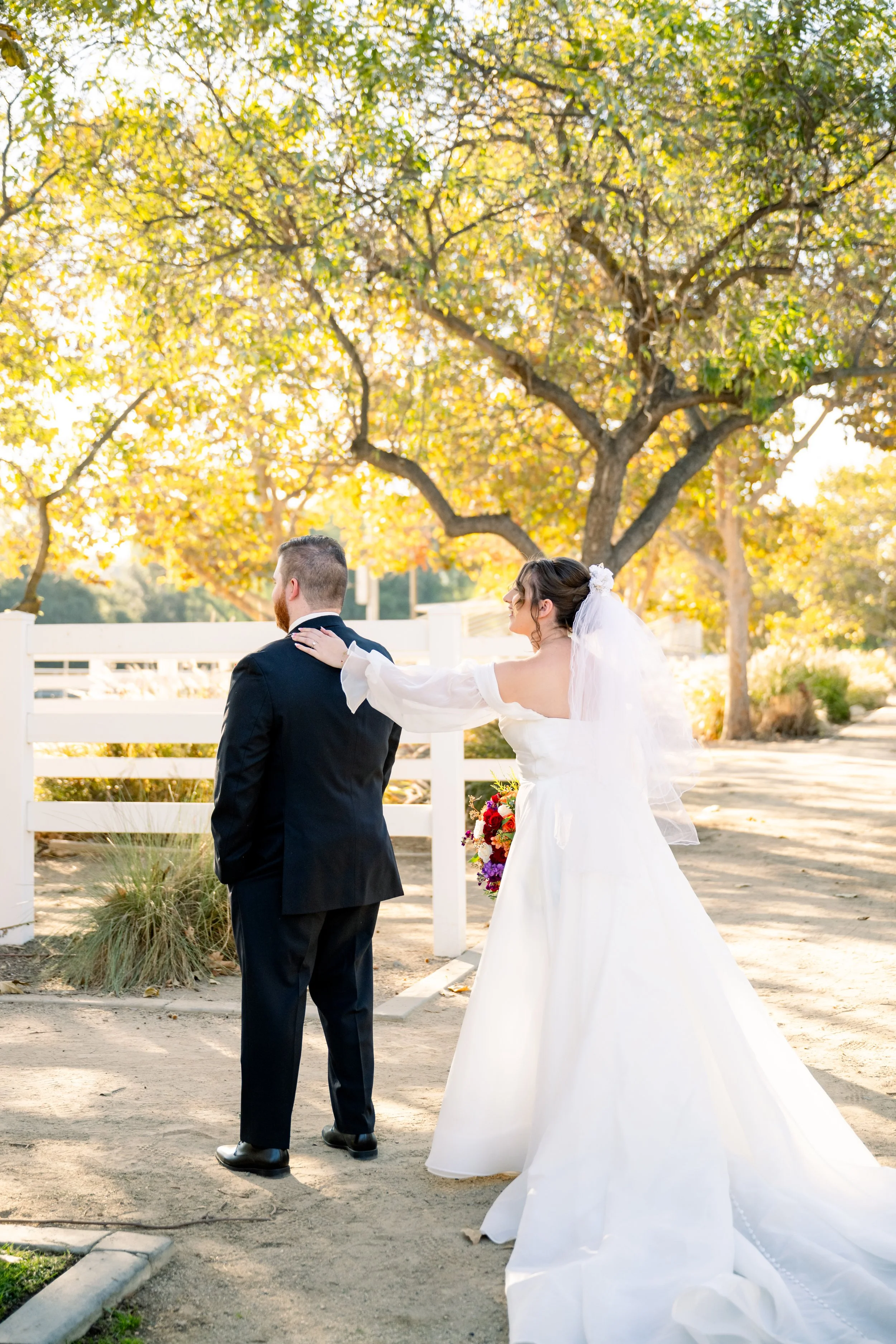 October wedding couple portrait with a mountain backdrop