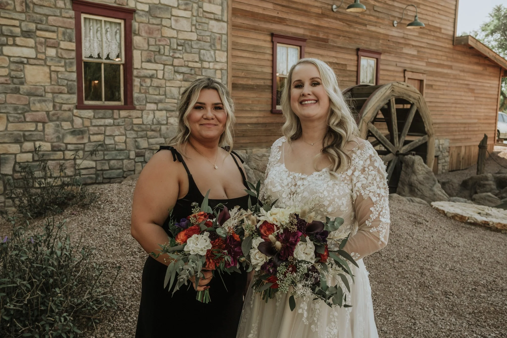 Bridesmaids in black gowns at a personalized Arizona fall wedding